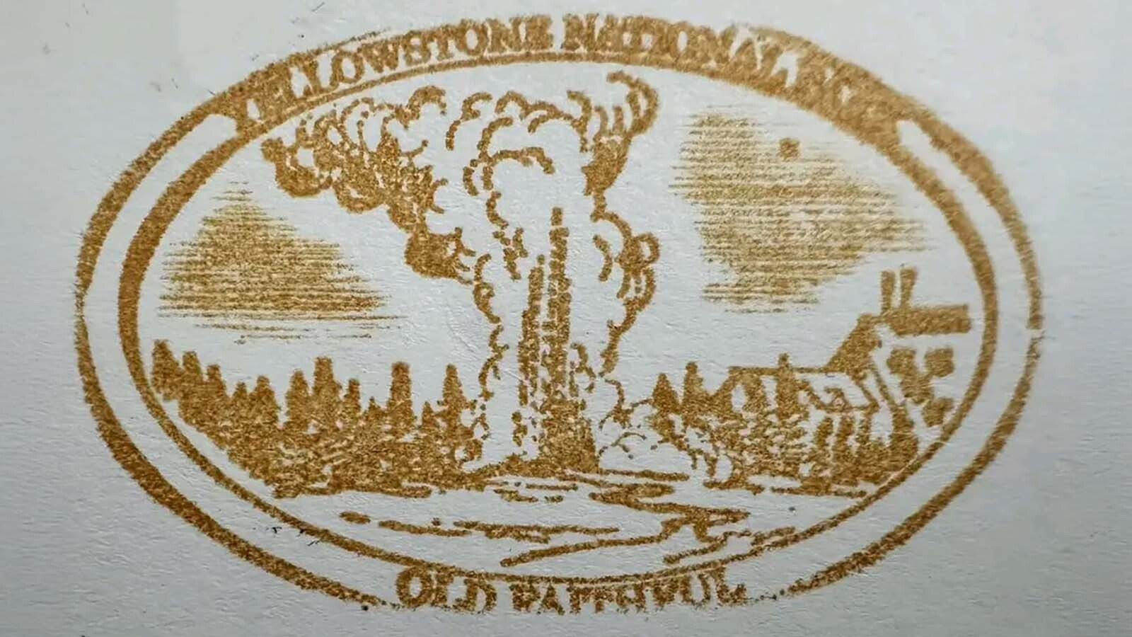 The Old Faithful stamp at the Old Faithful Visitor Center in Yellowstone National Park in 2025. There isn't much information on the history of this ornate stamp, but several Yellowstone visitors who have seen and gotten this stamp have been told it's over 90 years old and is only available upon request.