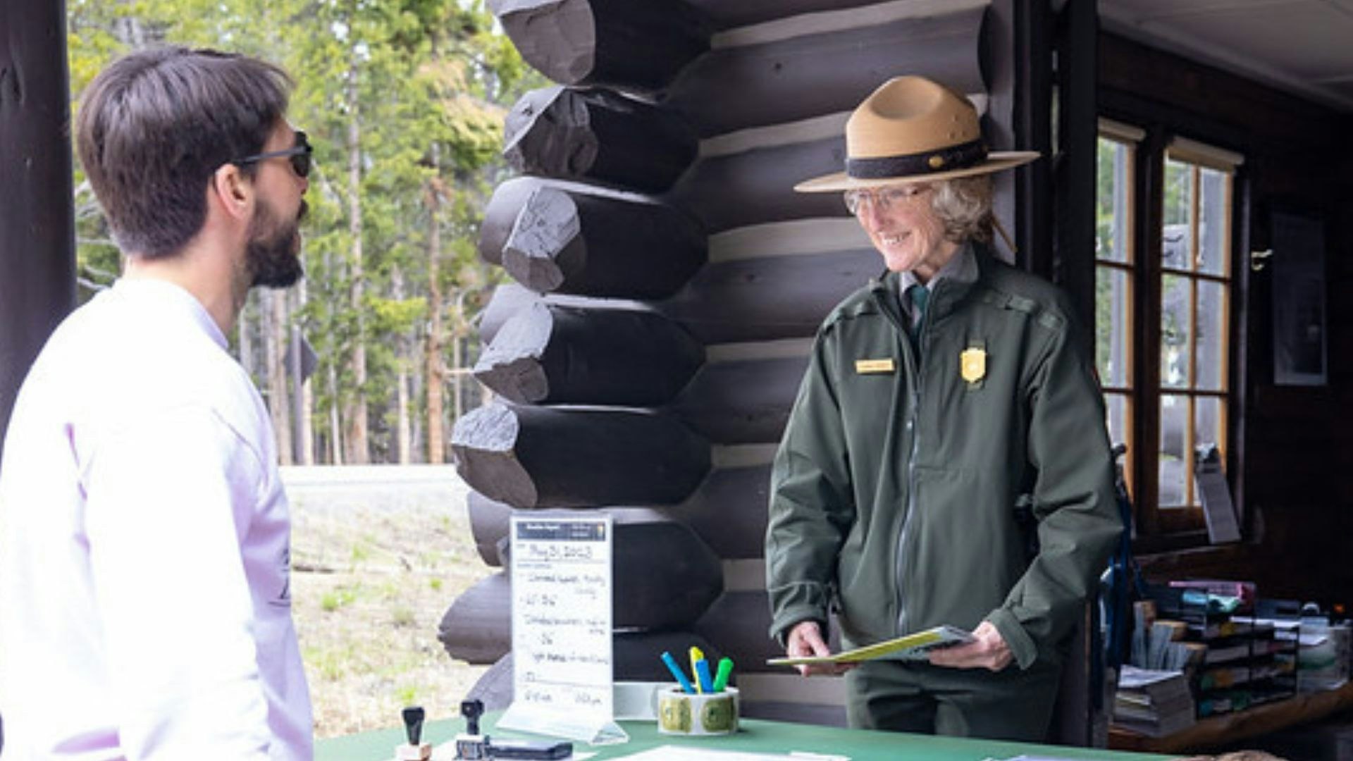 A Yellowstone National Park ranger recruits a potential park employee.
