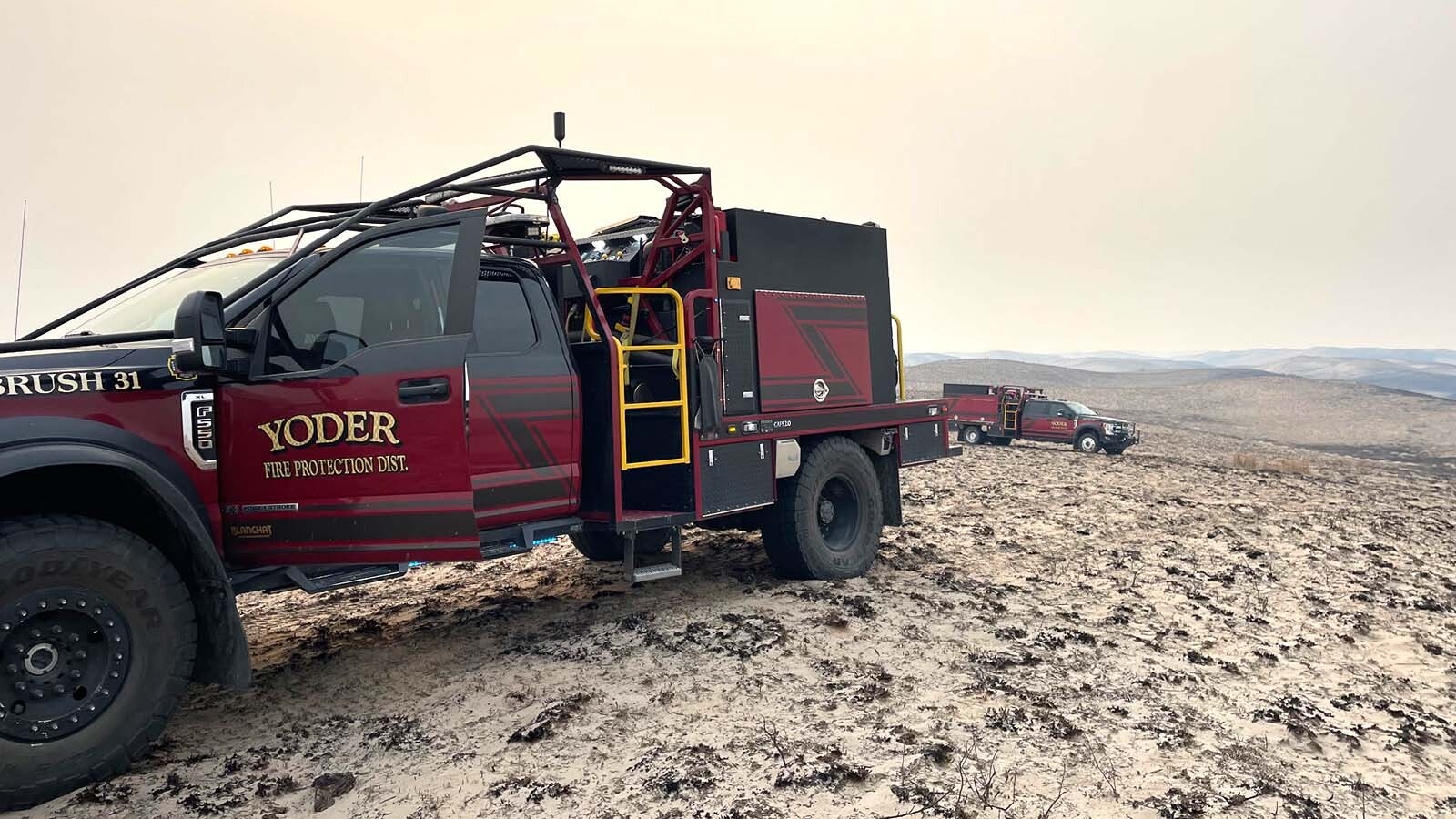 A pair of brush trucks the Yoder Fire Protection District has taken to Nebraska to help fight wildfires.