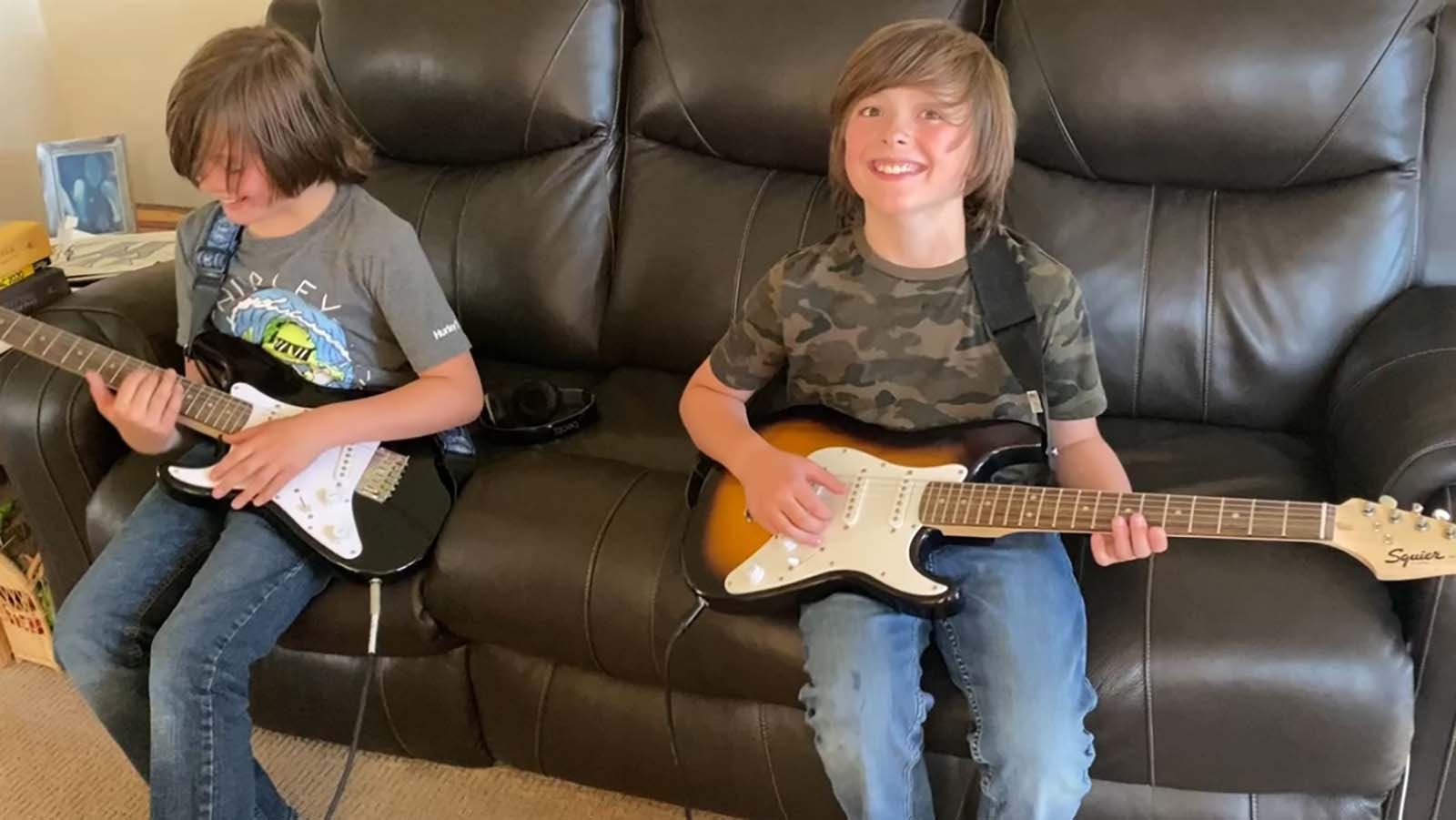 On the 11th Birthday, Lane and Liam Jordan received their first guitars from Grandma.