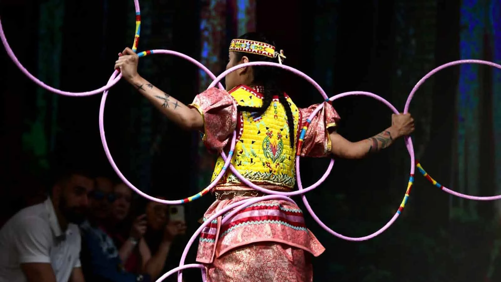 Zariah Whiteplume, 22, has been hoop dancing since she was eight years old. She continues to perform in her spare time, most recently in Tokyo, but spends most of her time working on her electrical engineering degree. Whiteplume plans to return to the Wind River Reservation and Navajo reservation of her mother to help bring renewable resources to her tribes in a culturally respectfully way.