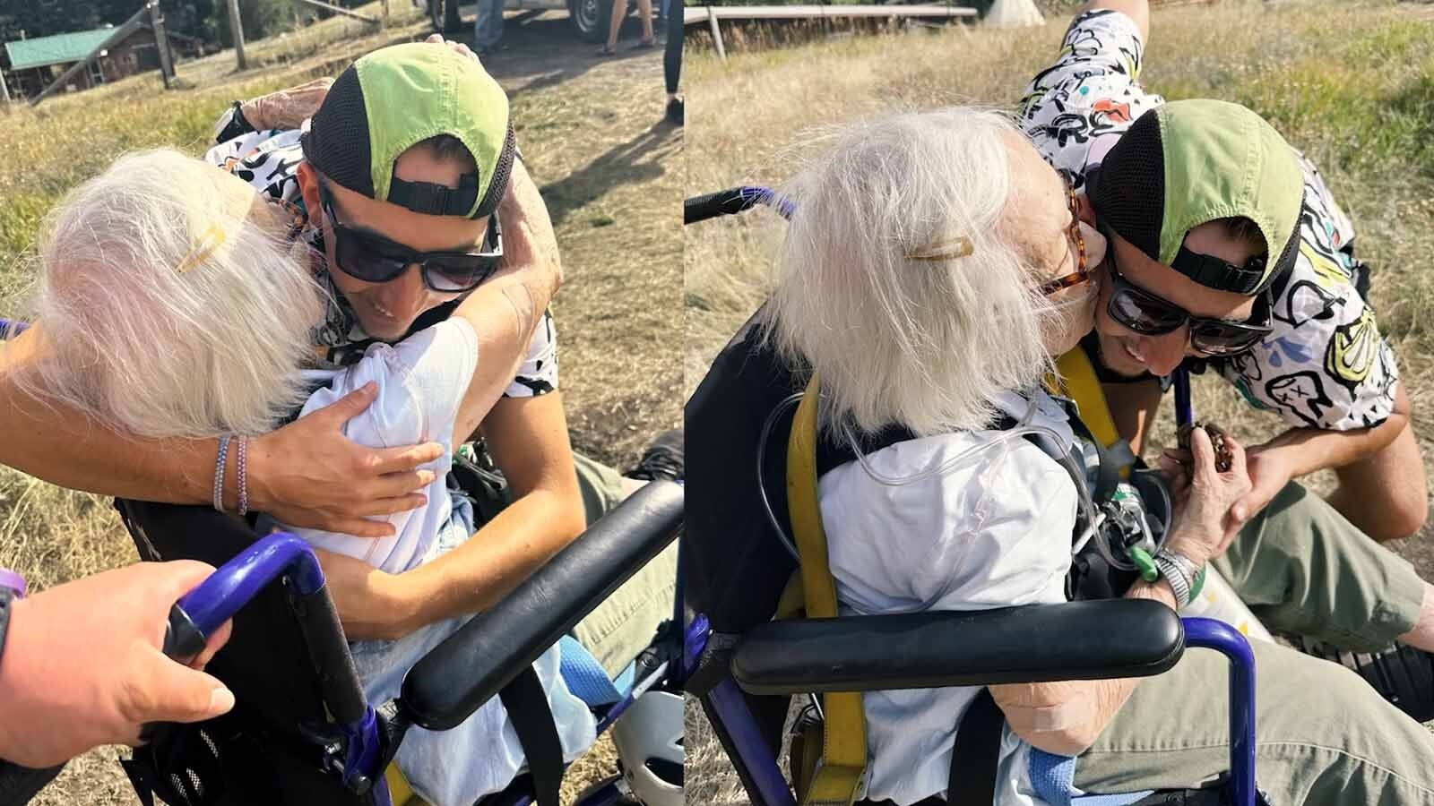 The Crossings assisting living resident Marklyn Lynn turned 100 this past spring, so as a late birthday presnent the facility arranged for her to check off her last bucket list item — to go ziplining. Here she shares a hug and gives a kiss to ziplining attendant Cody.