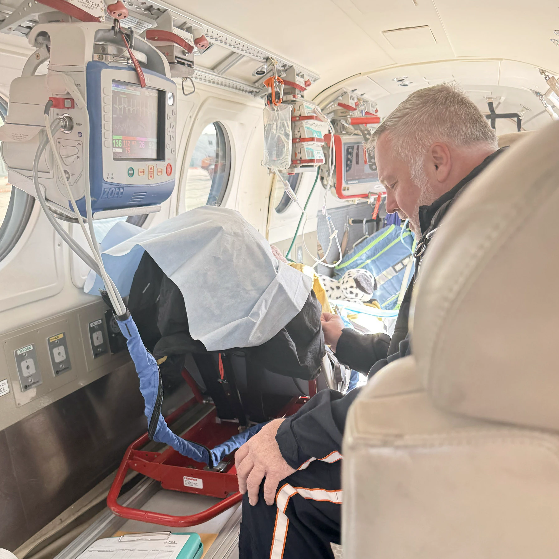 Seven-year-old Octaveia “Tavey” Mindrum is cared for aboard an AirLife medical aircraft during her transfer from Gillette to Children’s Hospital Colorado after becoming severely ill with rhinovirus.