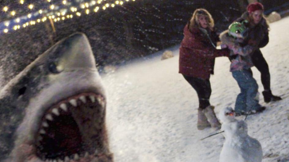 Anna-Louise Jackson (far right) getting chased by a shark in "Sharktana." This is a test photo of the shark effects the studio is working on.