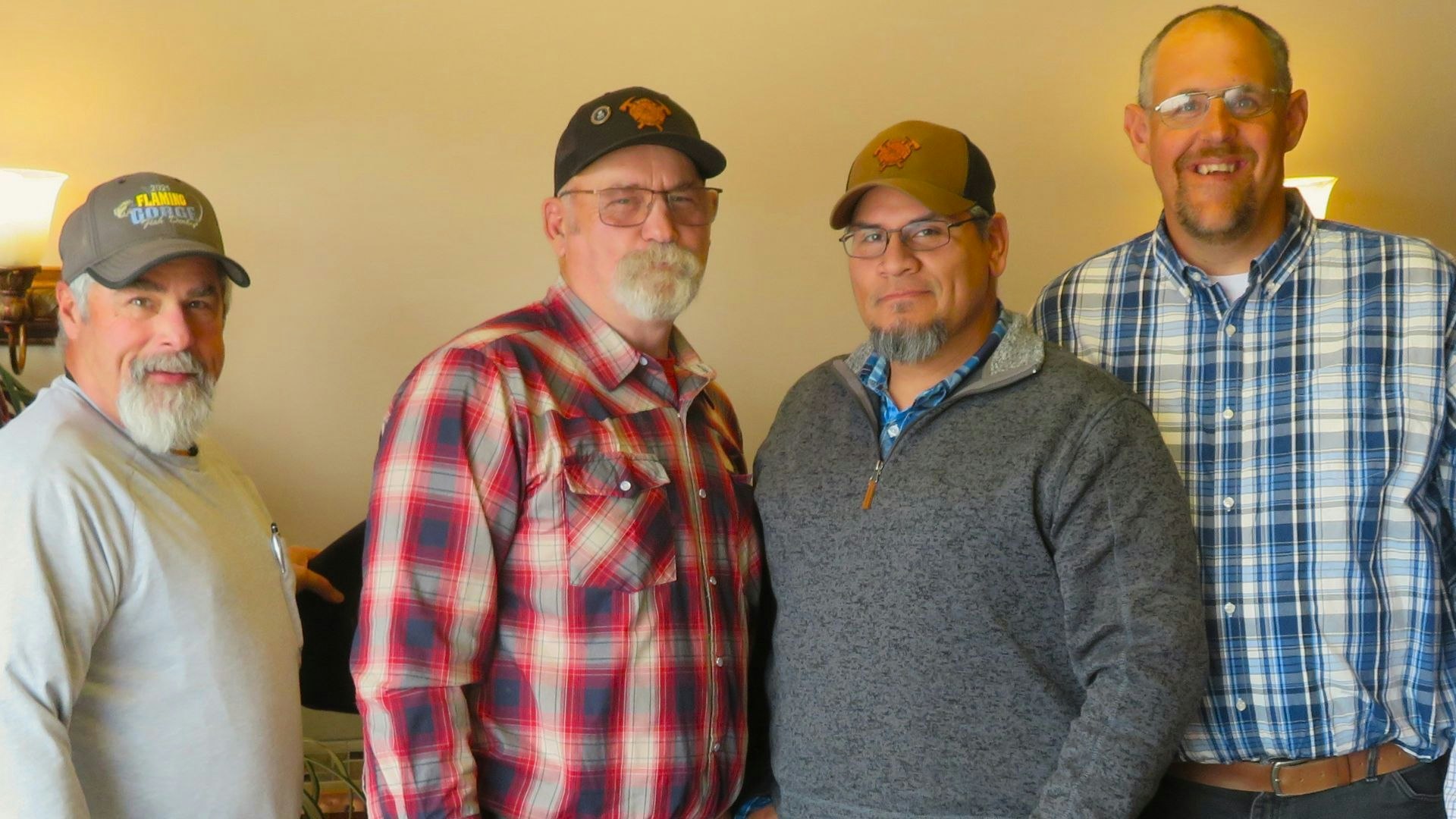 Wyoming Department of Transportation workers, from left, Craig Brown, Fred Sherburne, Catarino Zapata and Logan Whipple were recently recognized for their heroic actions saving a man from a suicide attempt in January.
