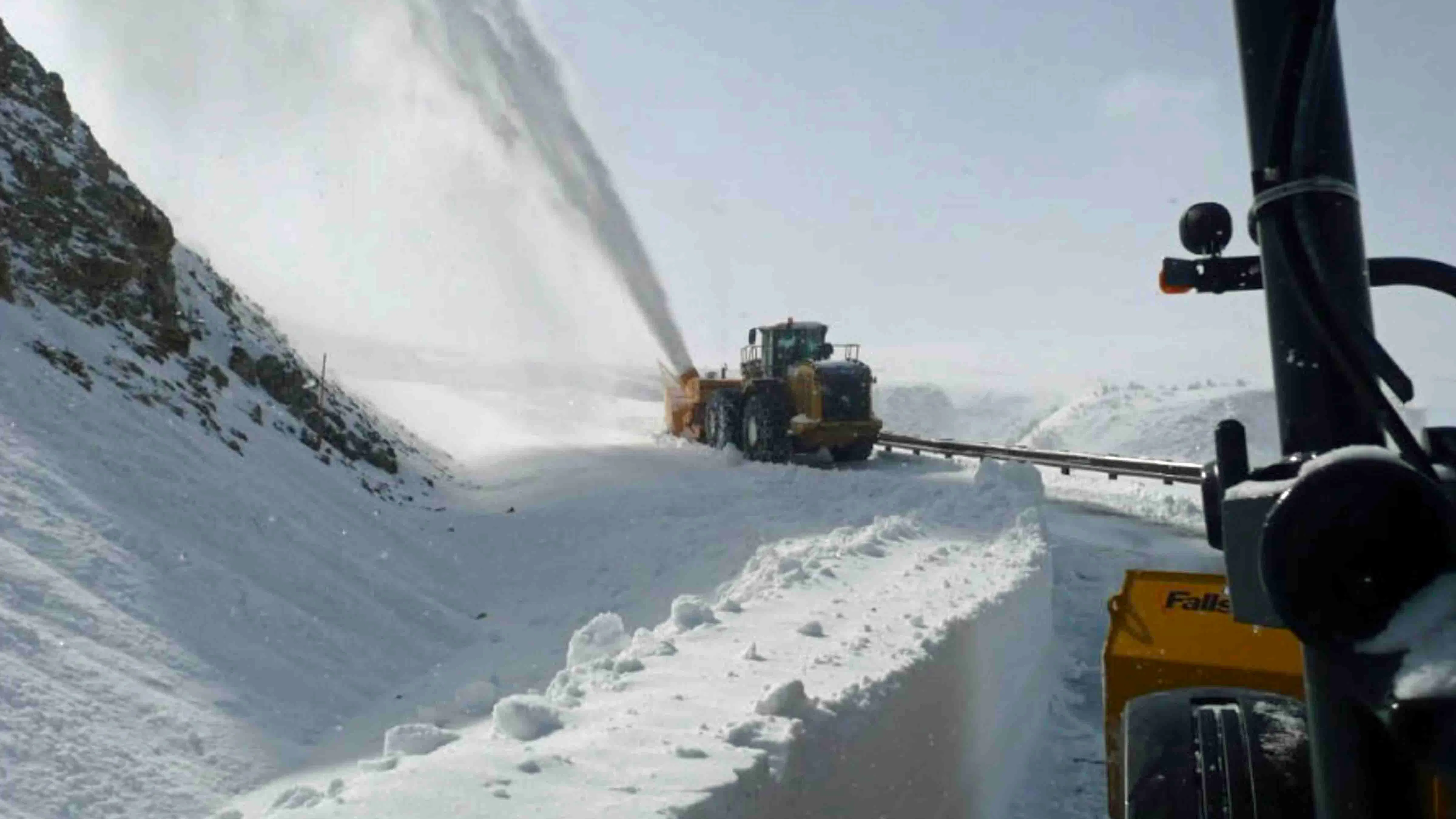 The Beartooth Highway wasn't open as scheduled Friday morning after more than a foot of heavy snow was cleared from its summit. The National Park Service "tentatively" hopes it will be open by Saturday morning. 