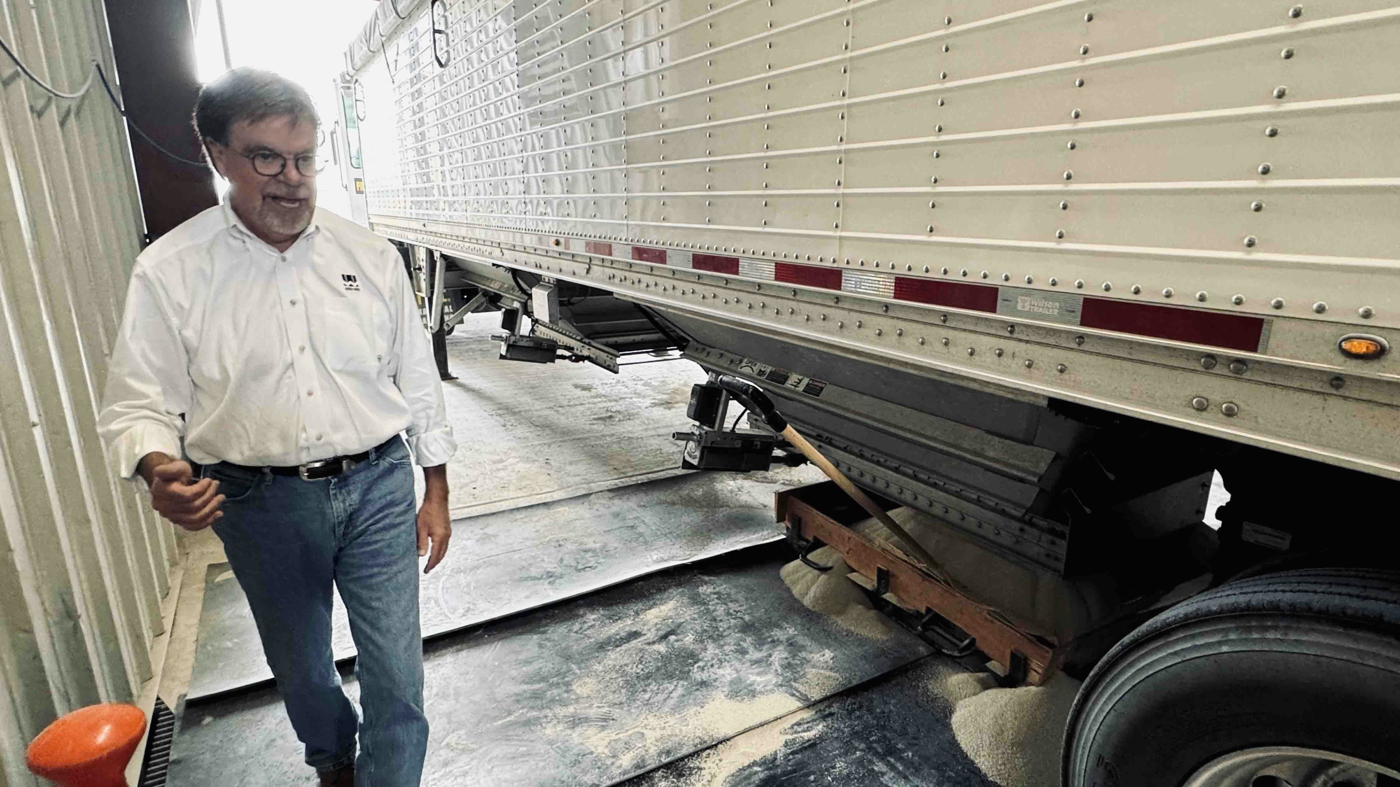 The bentonite is delivered to one of Wyo-Ben Inc.’s plants where it is unloaded by releasing the mineral onto a conveyor belt, where it is brought inside the plant for packaging into cat litter bags.