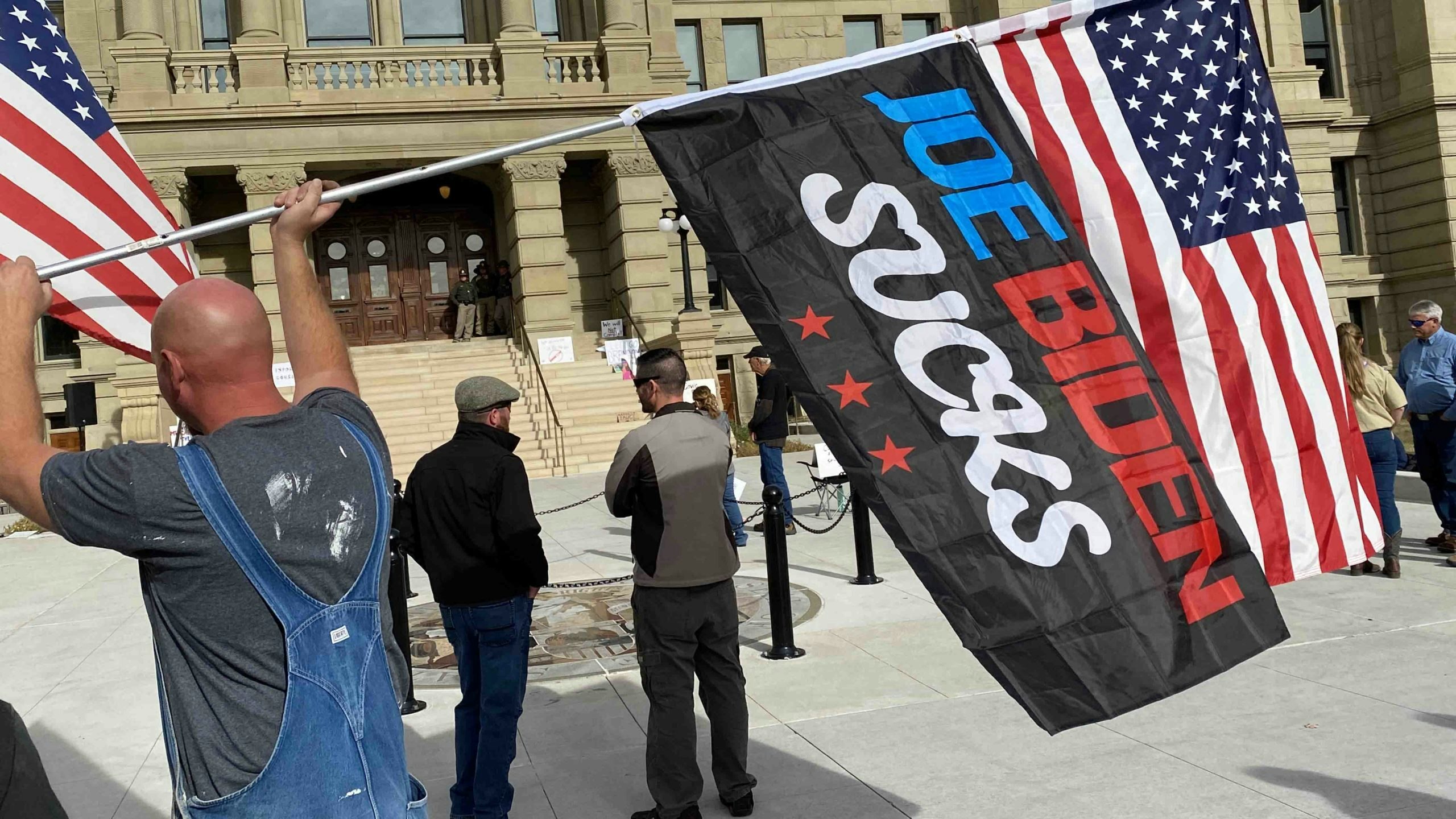 Biden sucks flag scaled