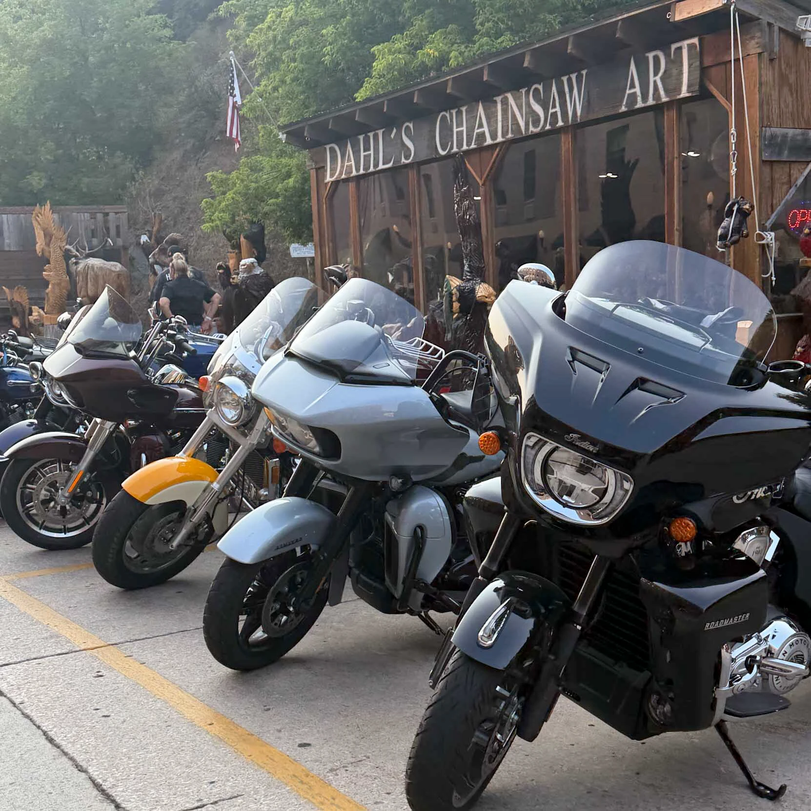 Motorcycles line the streets of Sturgis, where bars, vendors and businesses gear up to cash in on the hundreds of thousands of bikers who descend on the small South Dakota town each August.