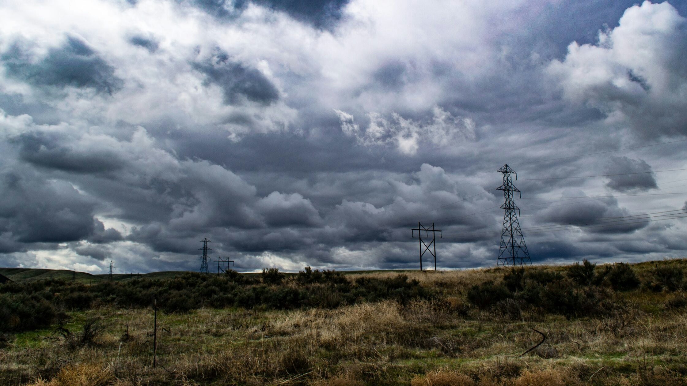 Blue sky clouds electrical lines 1021365 scaled
