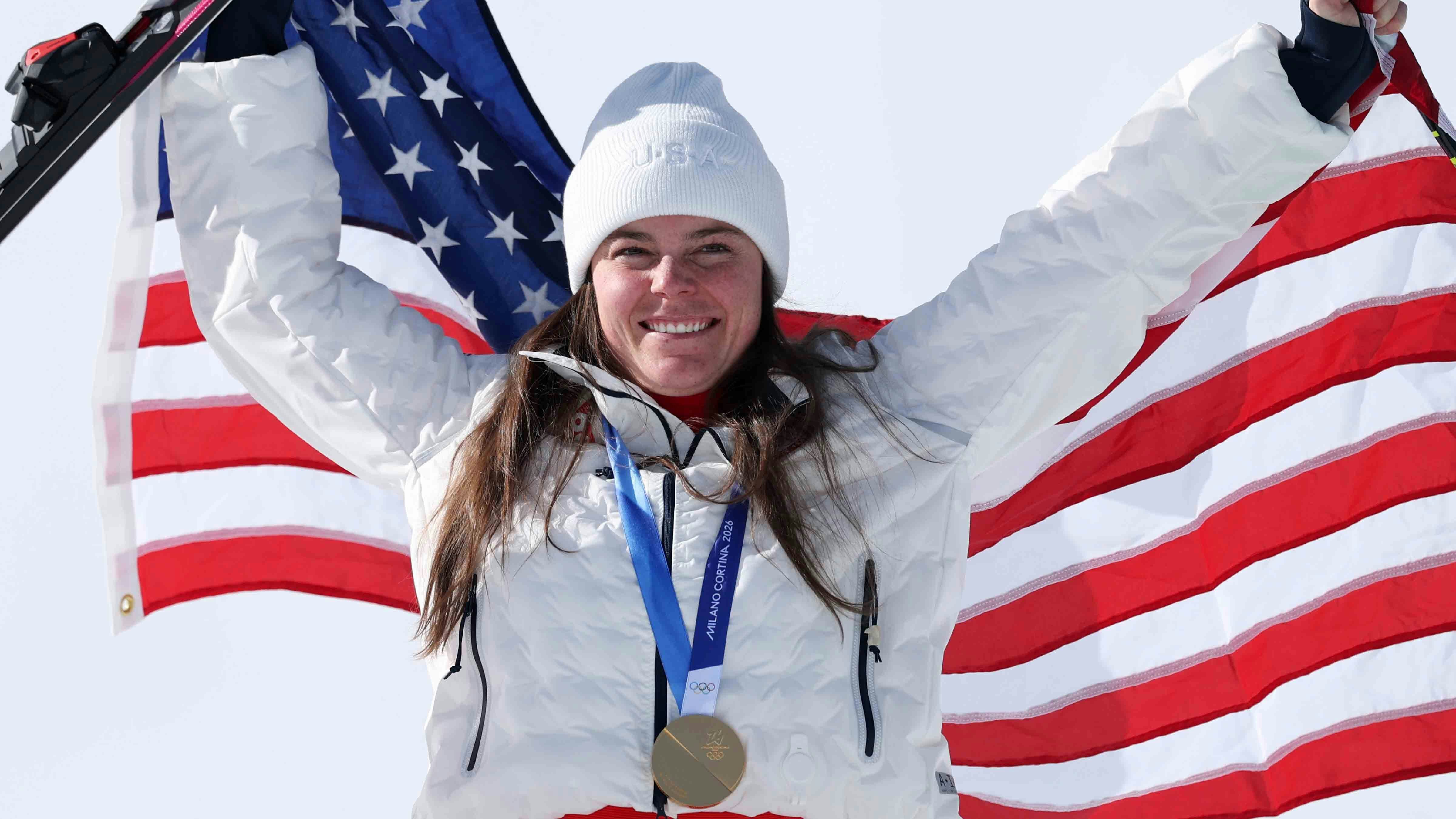 Gold medalist Breezy Johnson of Team United States poses for a photo during the medal ceremony for the Women's Downhill on day two of the Milano Cortina 2026 Winter Olympics at Tofane Alpine Skiing Centre on February 08, 2026 in Cortina d'Ampezzo, Italy.