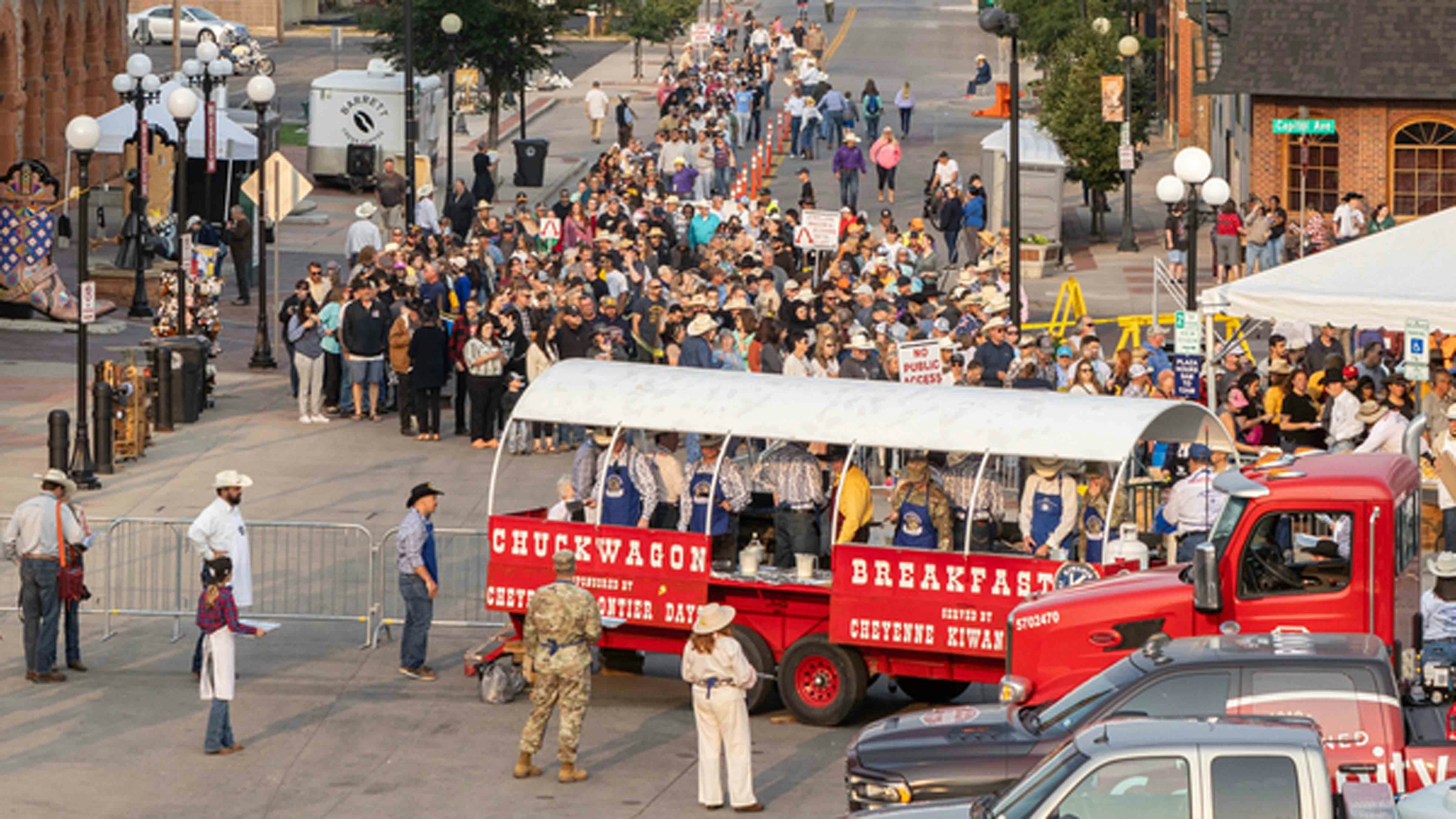 Crowds line up for the Cheyenne Frontier Days Free Pancake Breakfast in downtown Cheyenne, Wyoming on July 22, 2024.