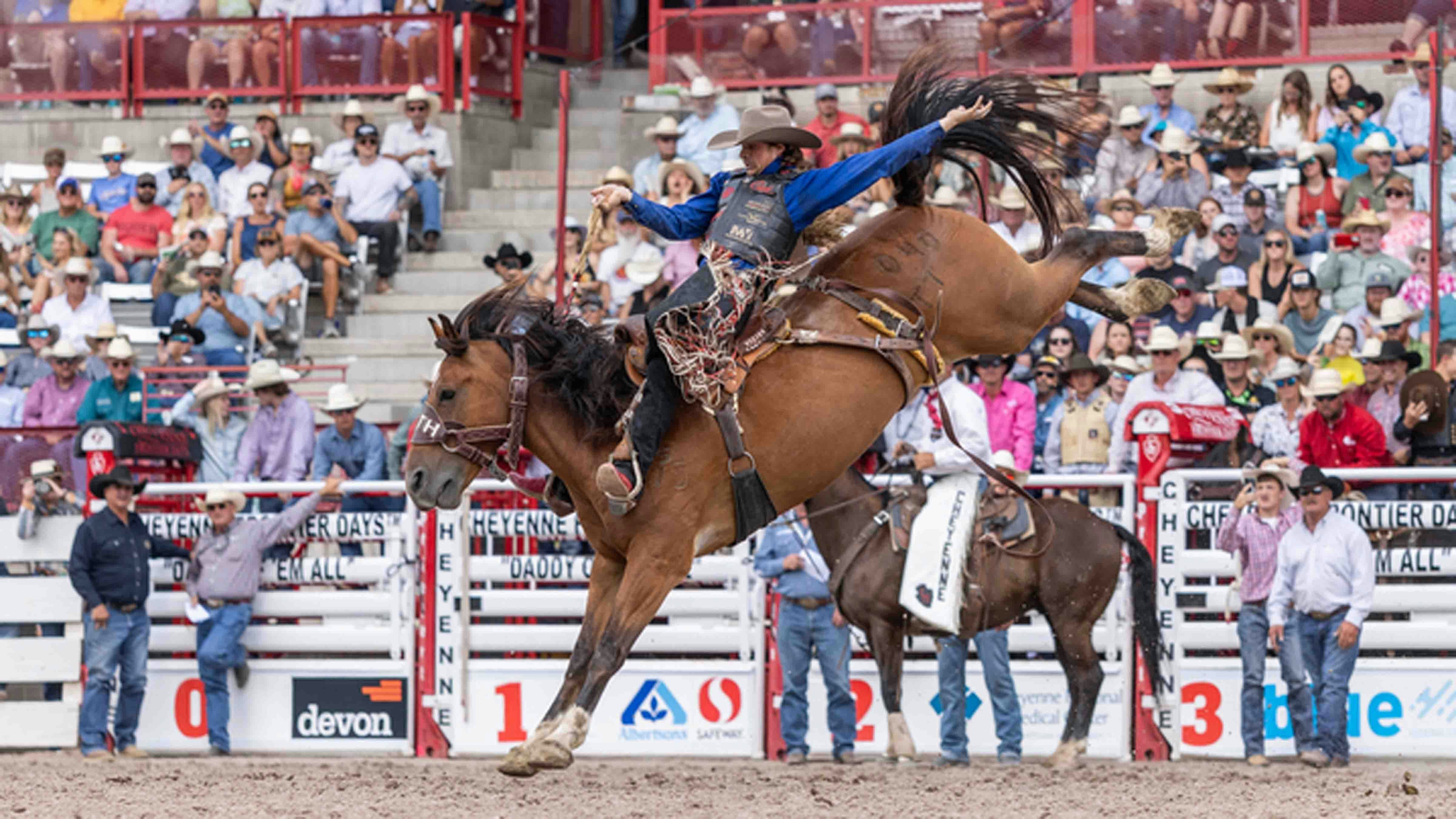 Lefty Holman from Visalia, CA rides his horse in the saddle bronc riding to score 87.50 points and tie for 6th place on Champion Sunday at Cheyenne Frontier Days on July 28, 2024.