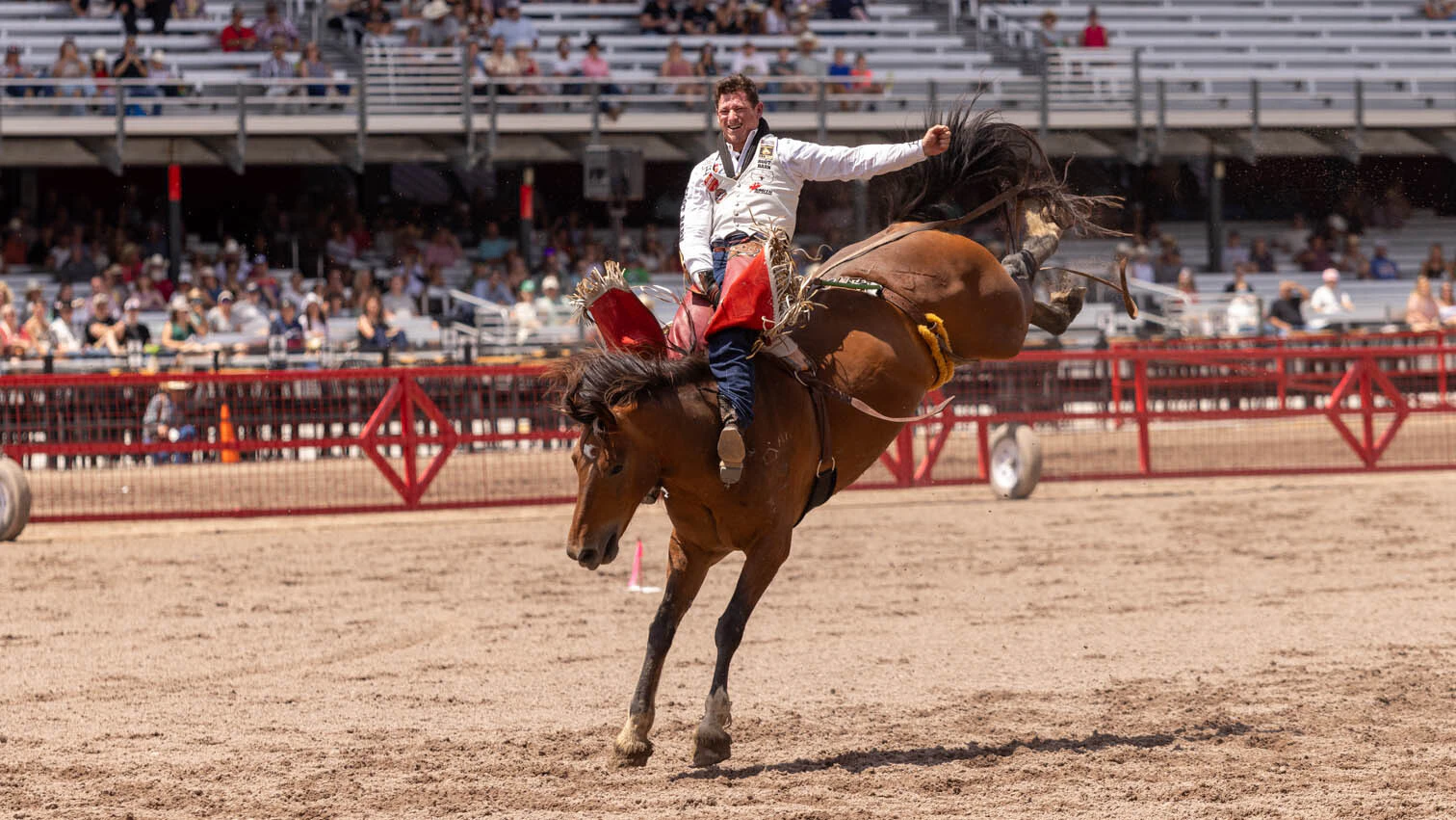 Kade Sonnier from Carencro, LA, in the bareback riding at the rodeo at Cheyenne Frontier Days Semi-Finals on Friday, July 24. Kade scored 89.50 points to win the bareback riding.
