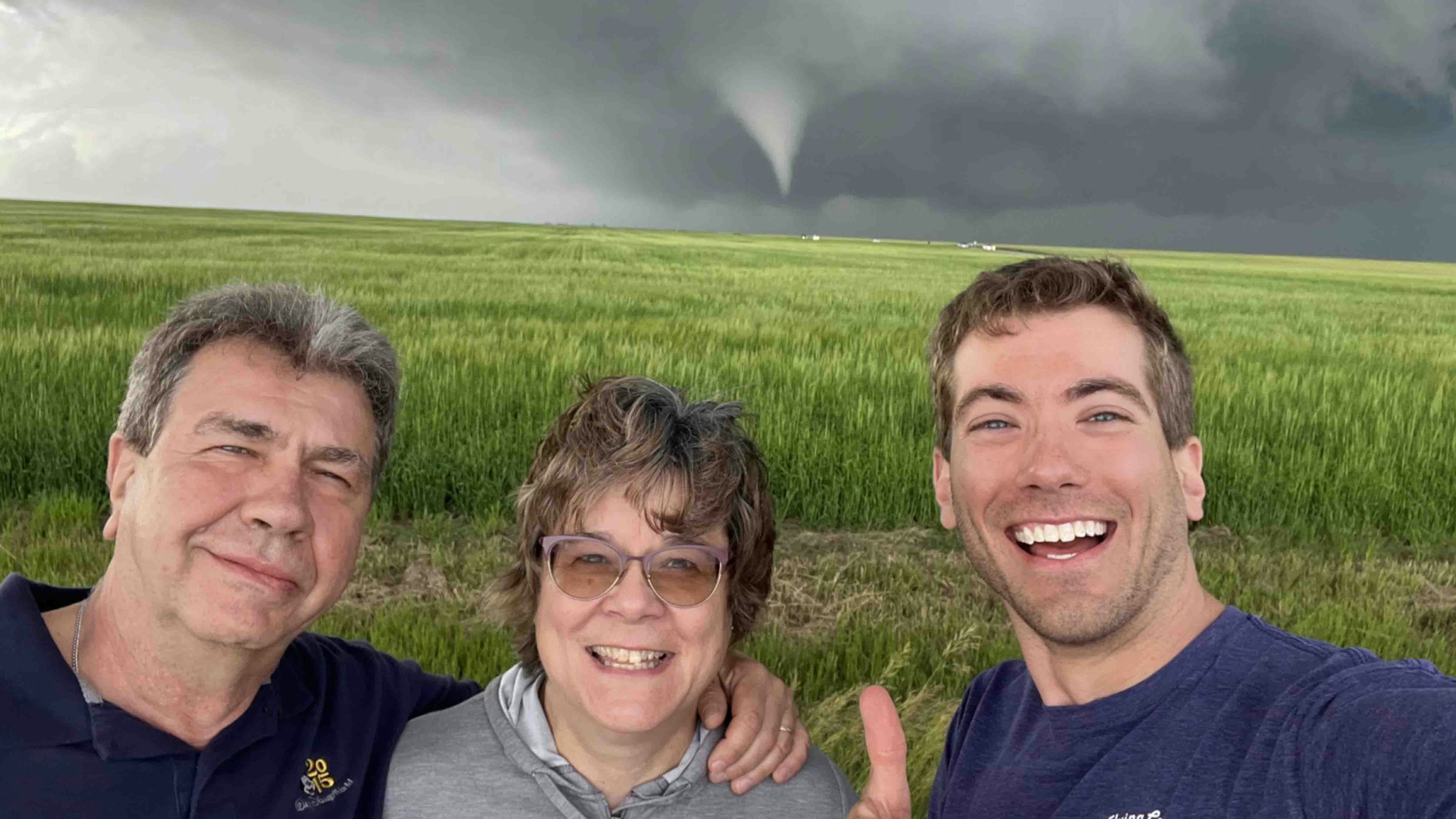 Photo of meteorologist Michael Charnik and family, via Twitter