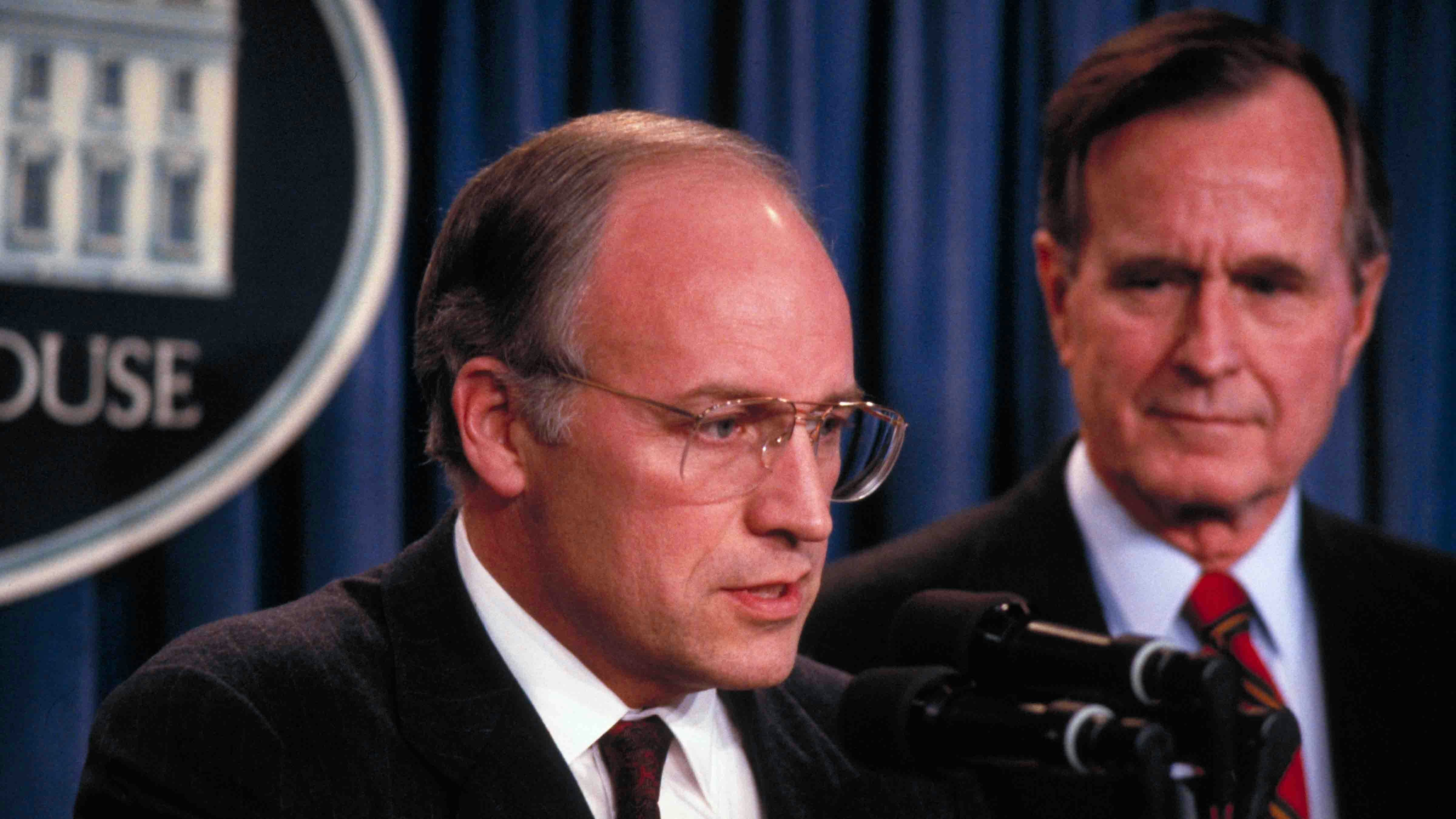 Pres. George Bush looking on, as Def. Secy. designate Dick Cheney speaks to press in 1989. (Photo by Diana Walker/Getty Images)