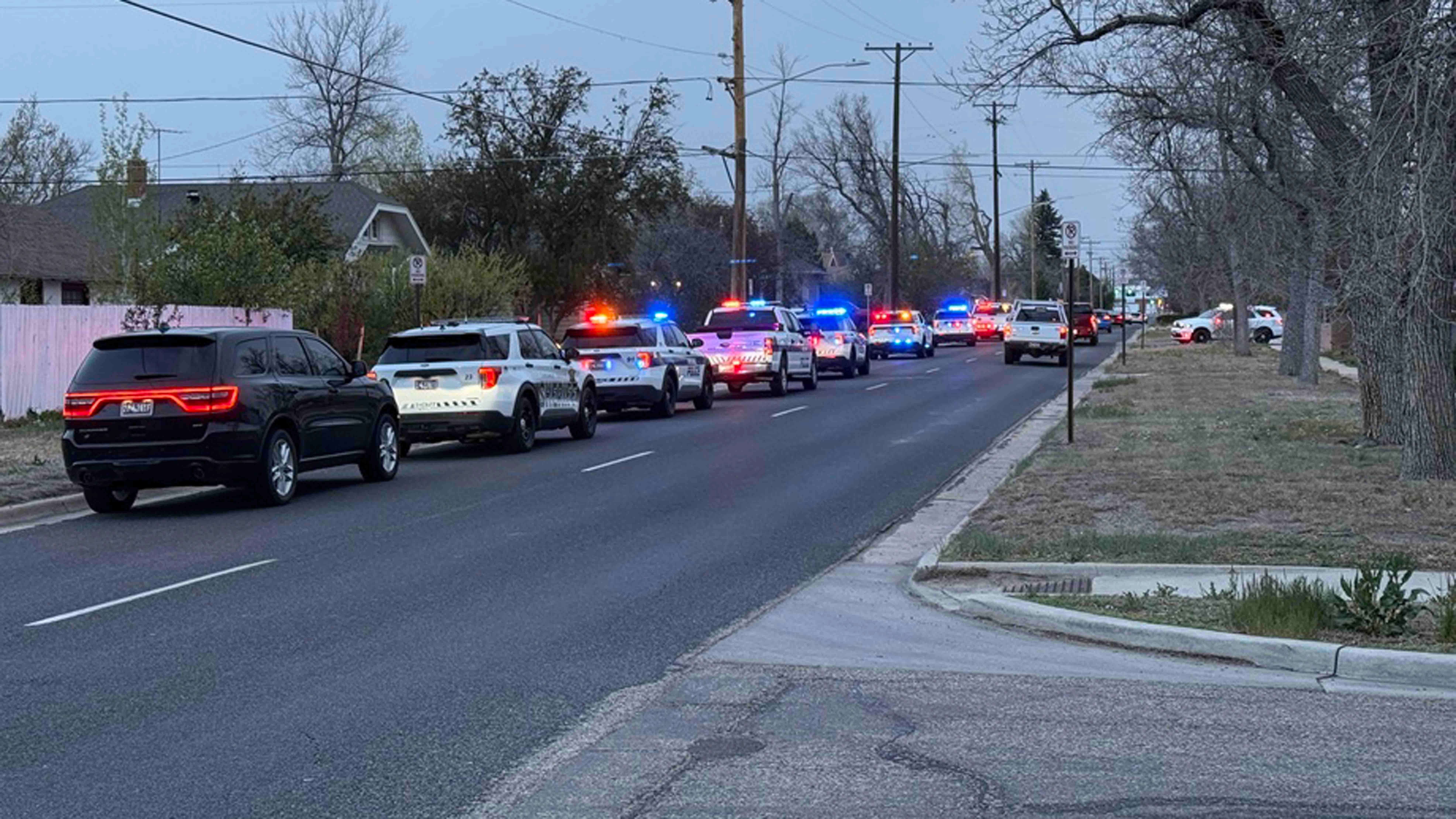 Dozens of law enforcement vehicles lined the streets of Warren Ave. and Central Ave. in Cheyenne near the scene of a reported shooting