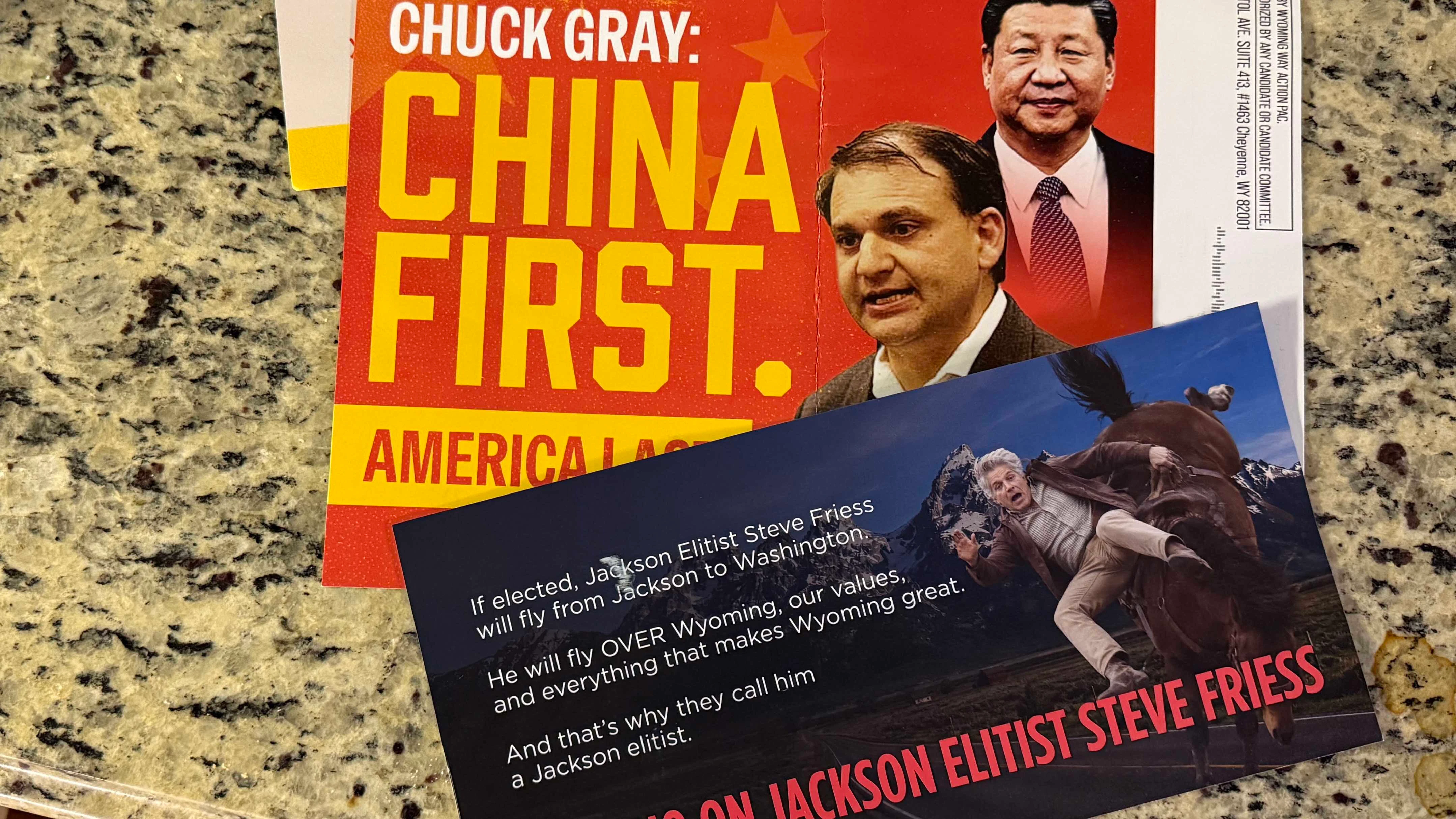 Campaign mailers attacking U.S. House candidates Chuck Gray and Steve Friess