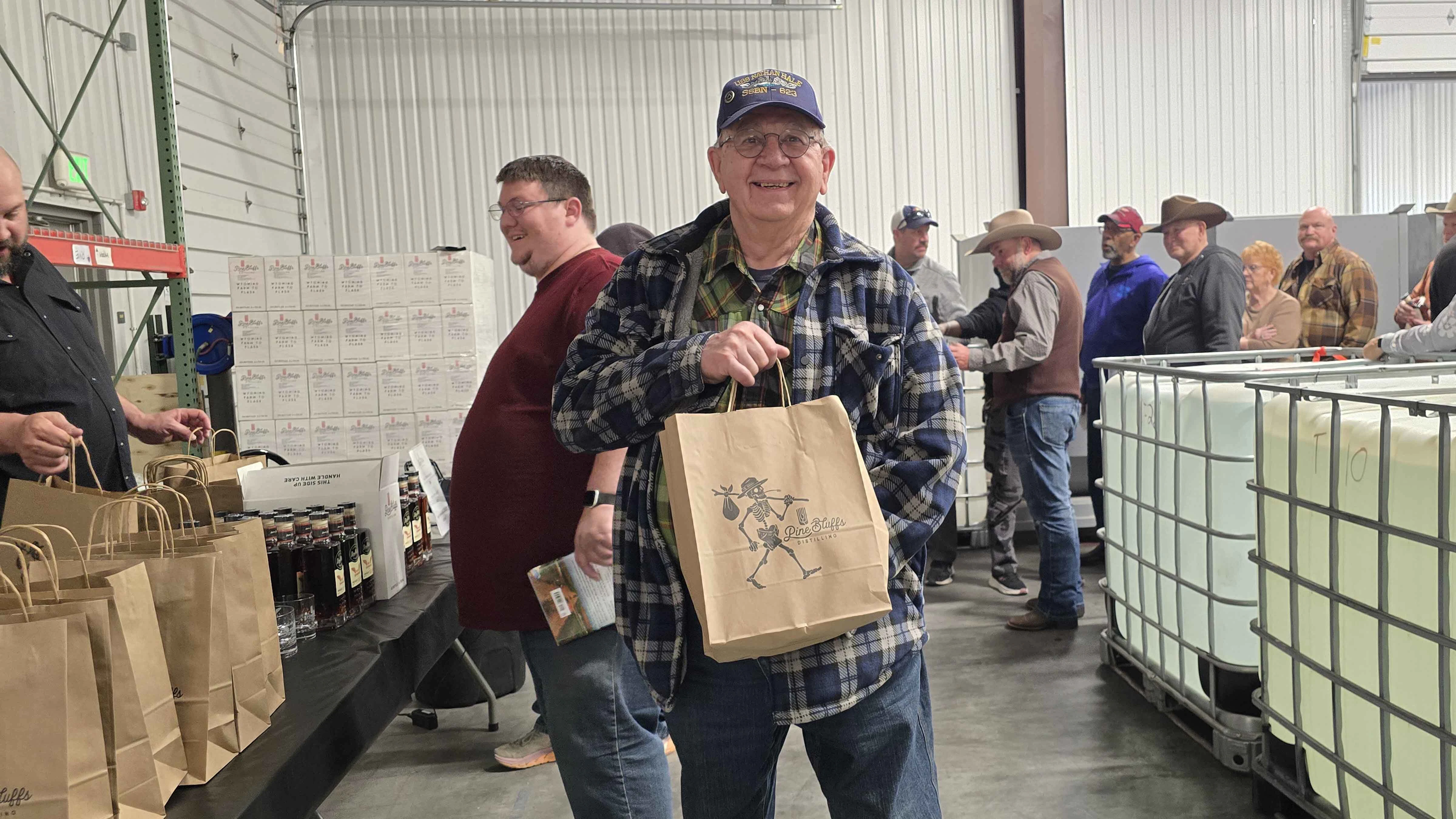 Glen Romig doesn't drink whiskey and has only just started reading C.J. Box books, but he was still in line with hundreds of others to pick up a bottle of Romanowksi Rye.