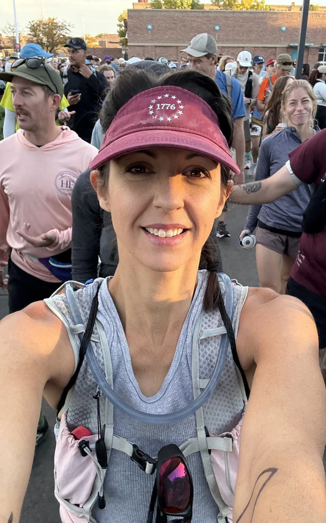 Cowboy State Daily's Clair McFarland runs the The Loco Strikes Back Taco Bell 50K ultramarathon in Denver on Saturday, Oct. 3, 2026, where runners have to make stops at 11 Taco Bells along a 31-mile run and eat a menu item at 10 of them.
