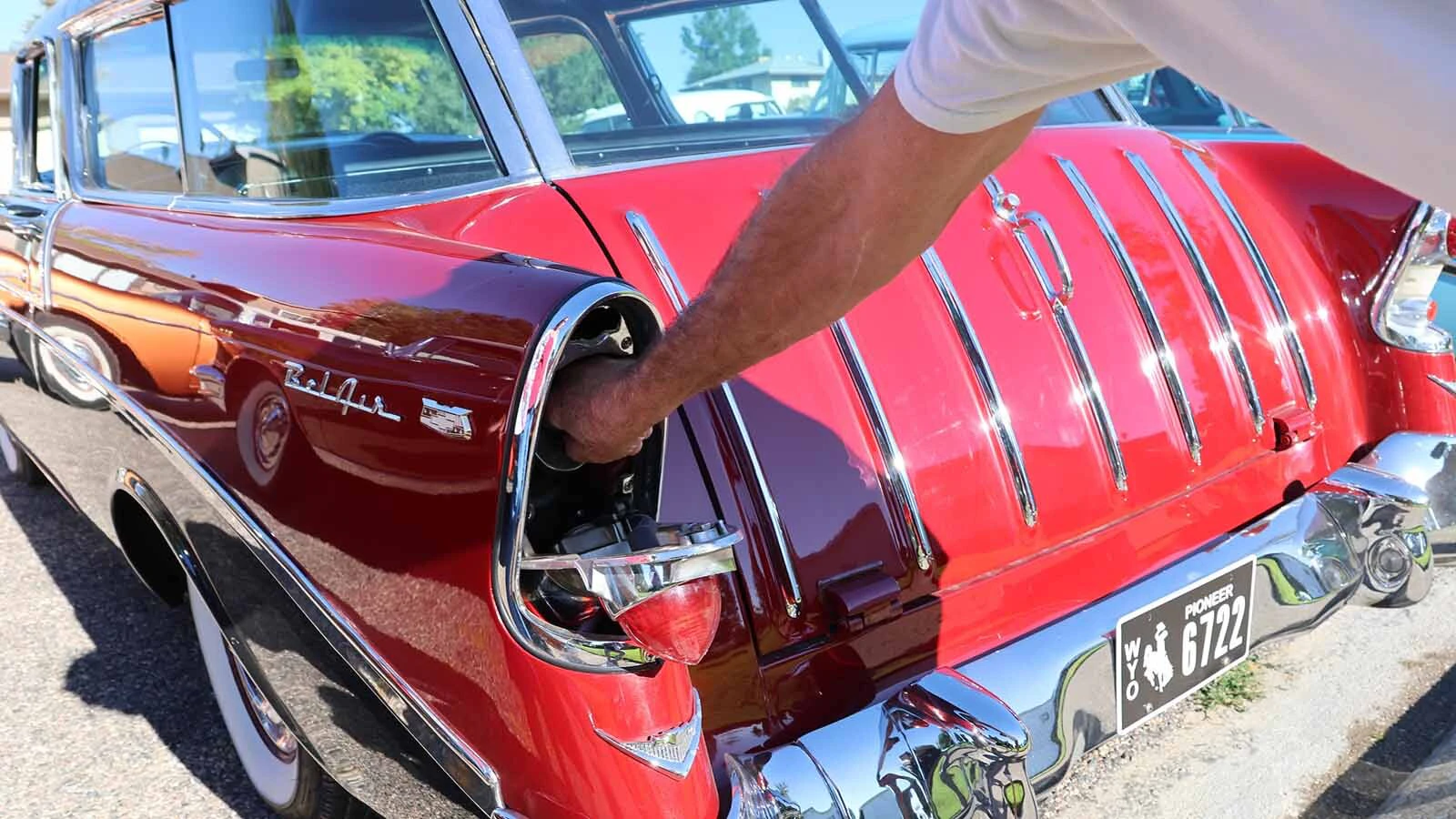 The gas tank on the 1956 Chevy Bel Air Nomad is hidden behind the left taillight.