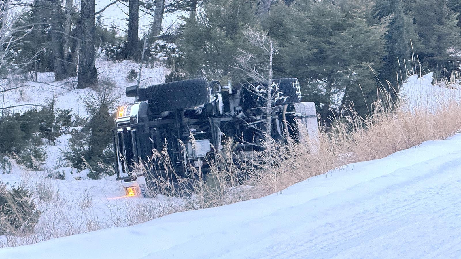 A snow coach that went off the road near Mammoth Hot Springs on the morning of Dec. 23, 2024. The driver was unhurt.