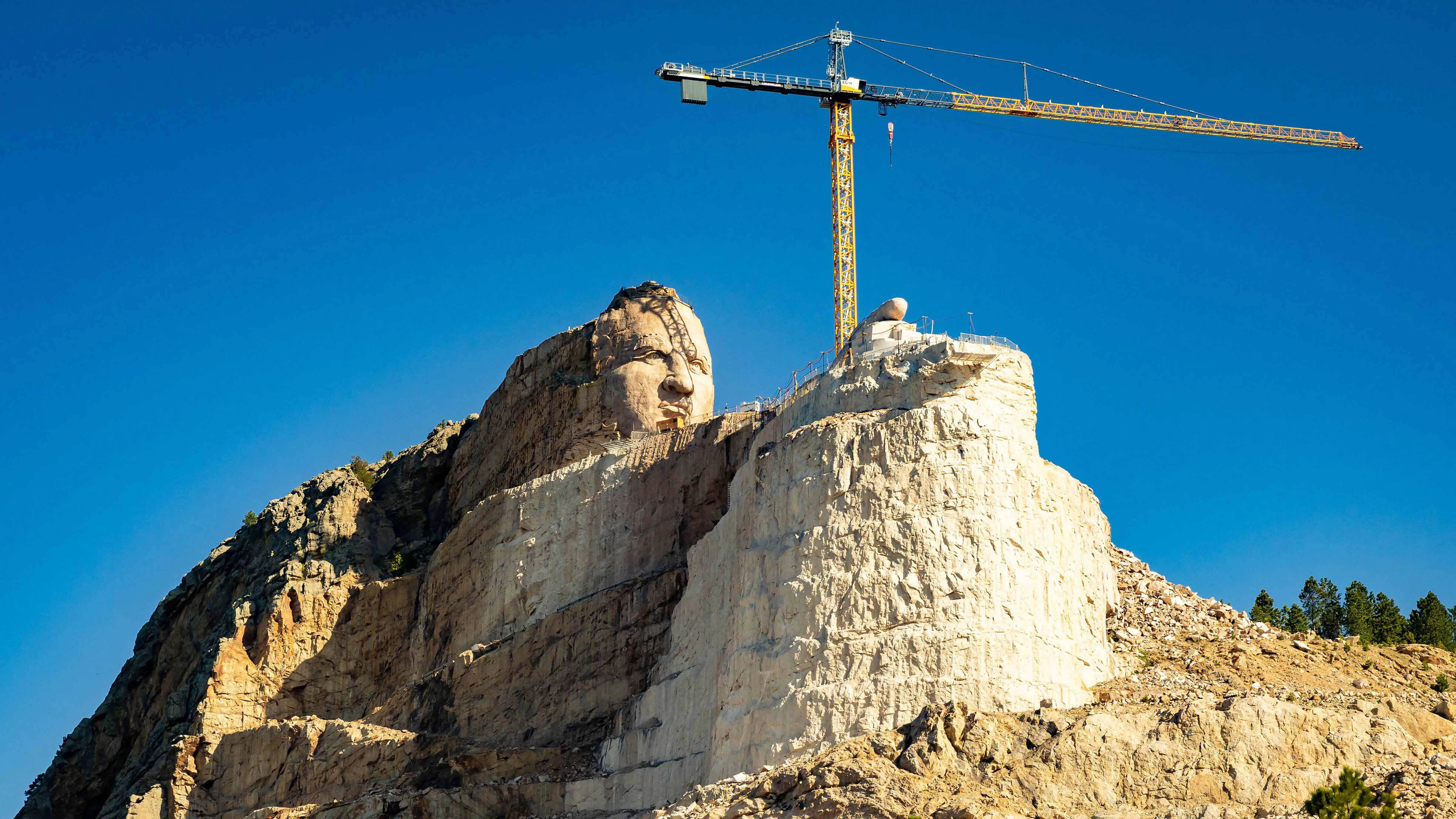 Close up view of Crazy Horse Memorial under construction at sunrise in South Dakota
