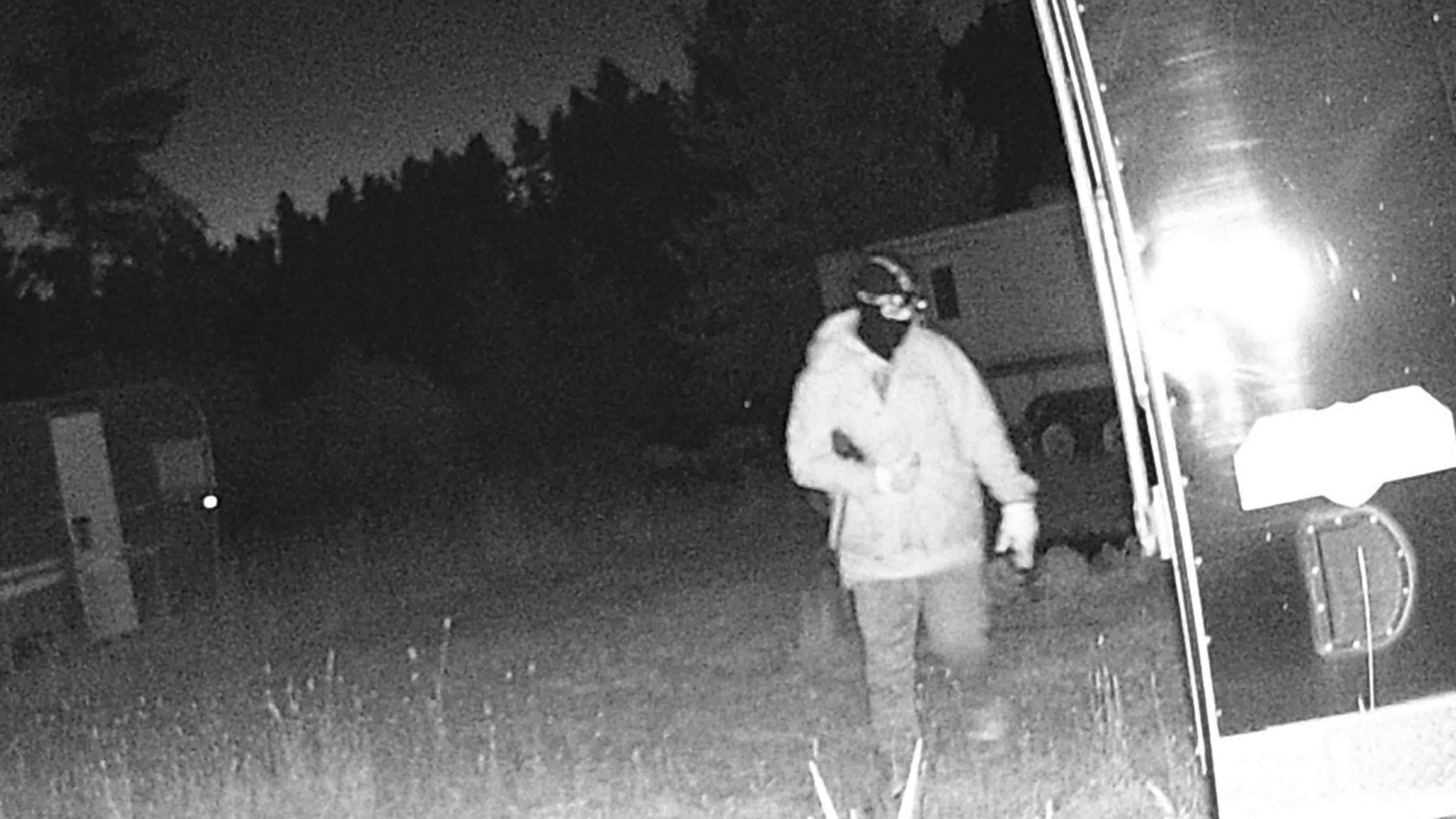 Trail cam photos captured several image of an unidentified masked man creeping around a campsite in the Bighorn Mountains in the wee hours of the morning on Thursday.