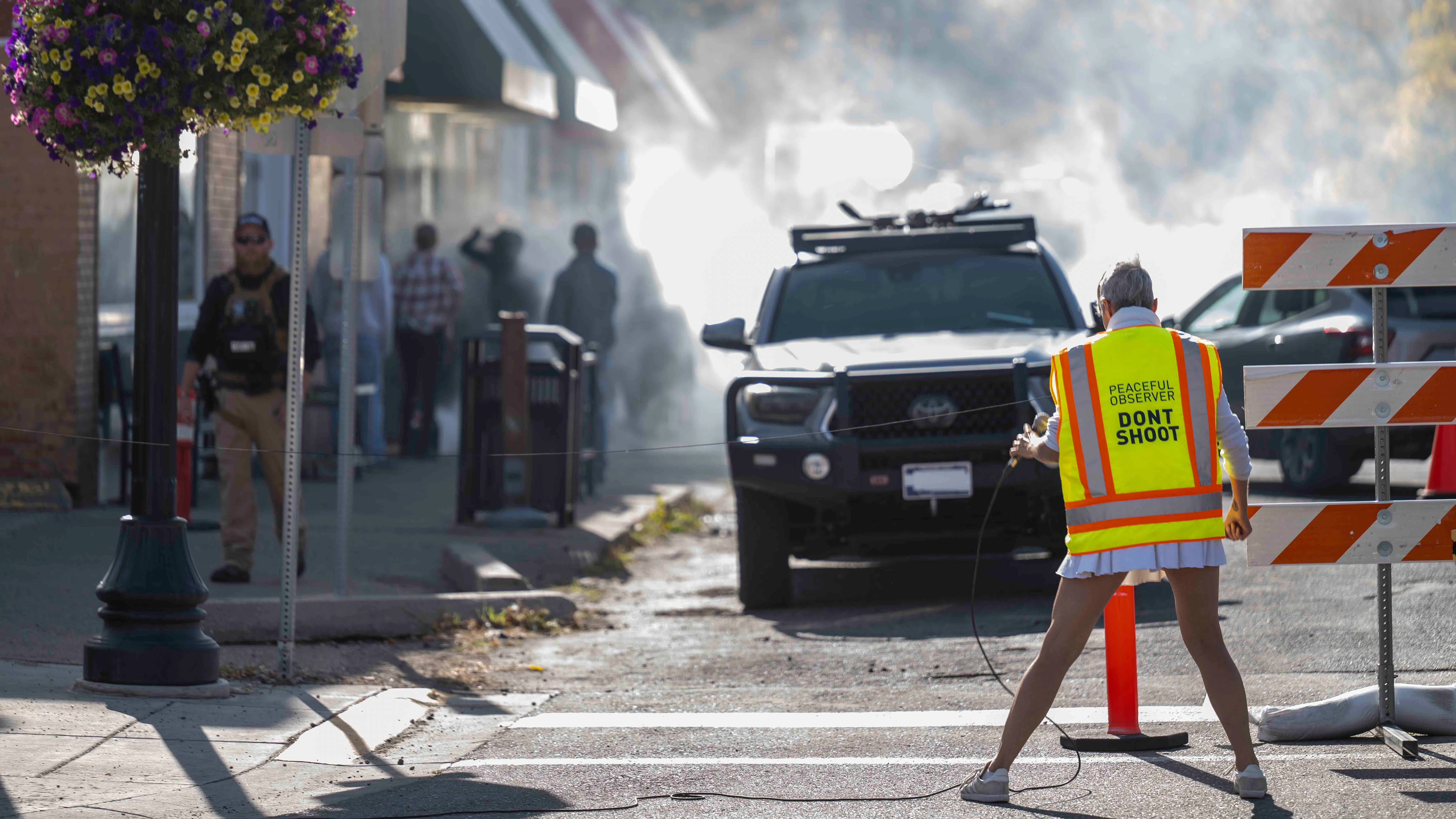 A protester during the filming of a scene for the Daily Wire pro-ICE movie called "Pawn Shop" on October 2, 2026 in Livingston, Montana.