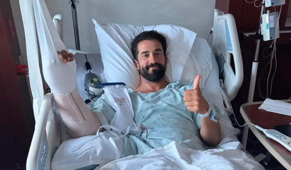 Daniel Crago in a hospital after being attacked by a grizzly in Glacier National Park.