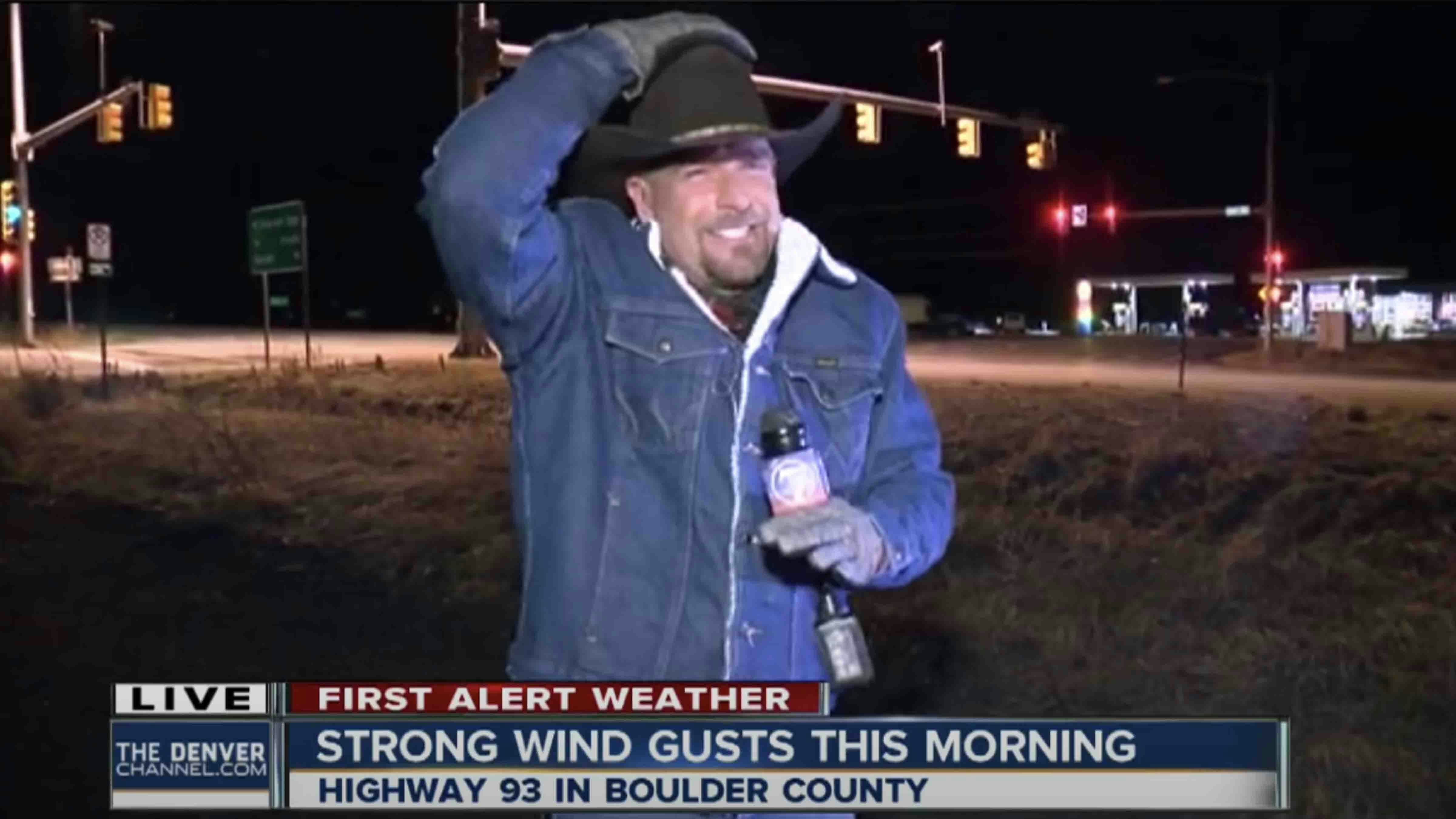 Weatherman Daryl Orr experiencing high winds in a live shot on Denver's Channel 7