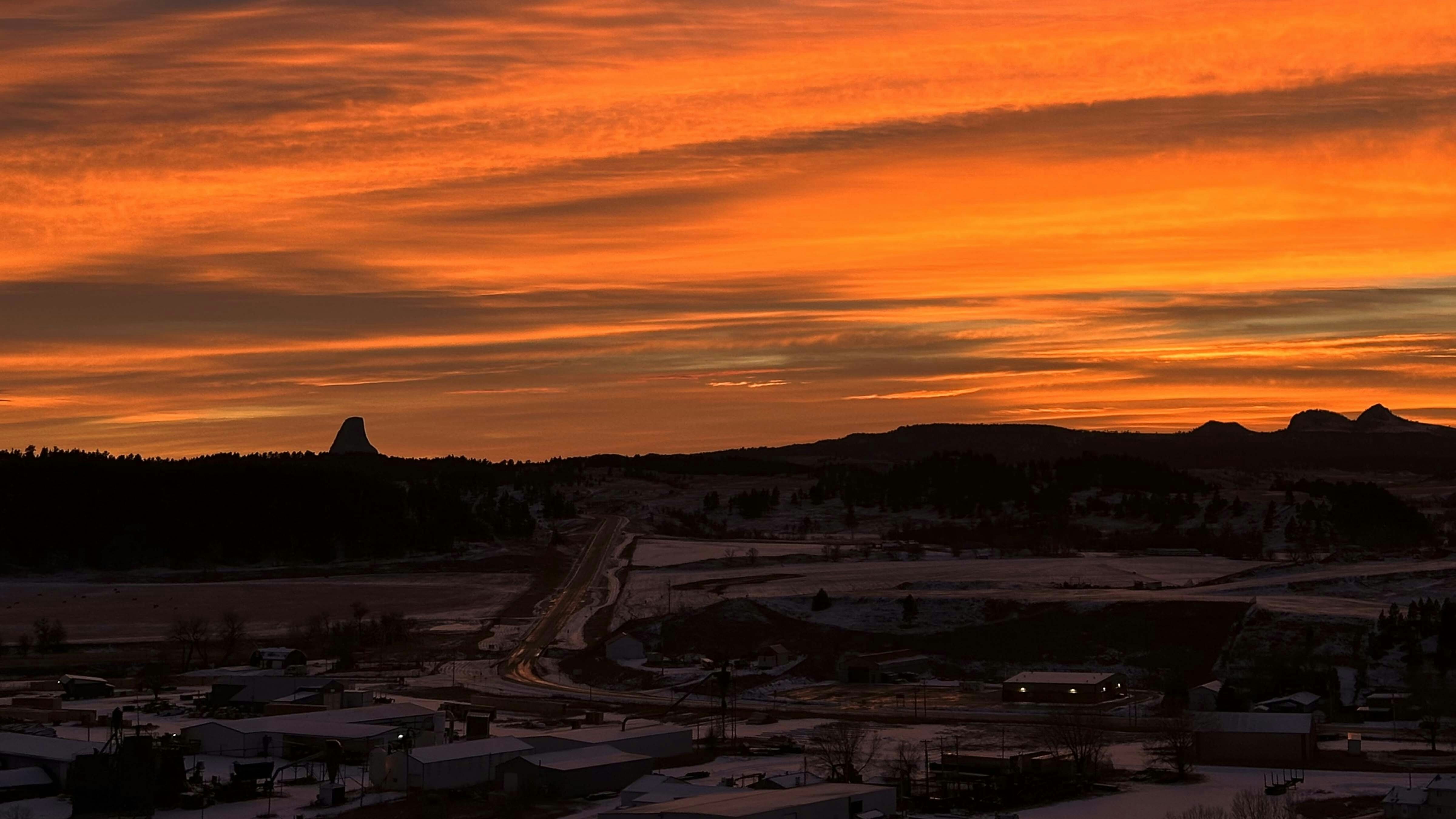 Magnificent Wyoming sunset over Hulett with Devils Tower and Missouri Buttes in background