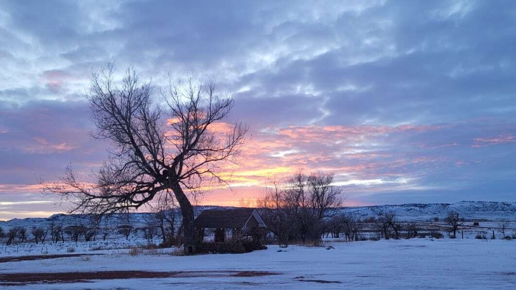 "Sunset over the Weston Hills at Soda Wells, Weston, Wyoming. Nature never fails to give us light and color. "