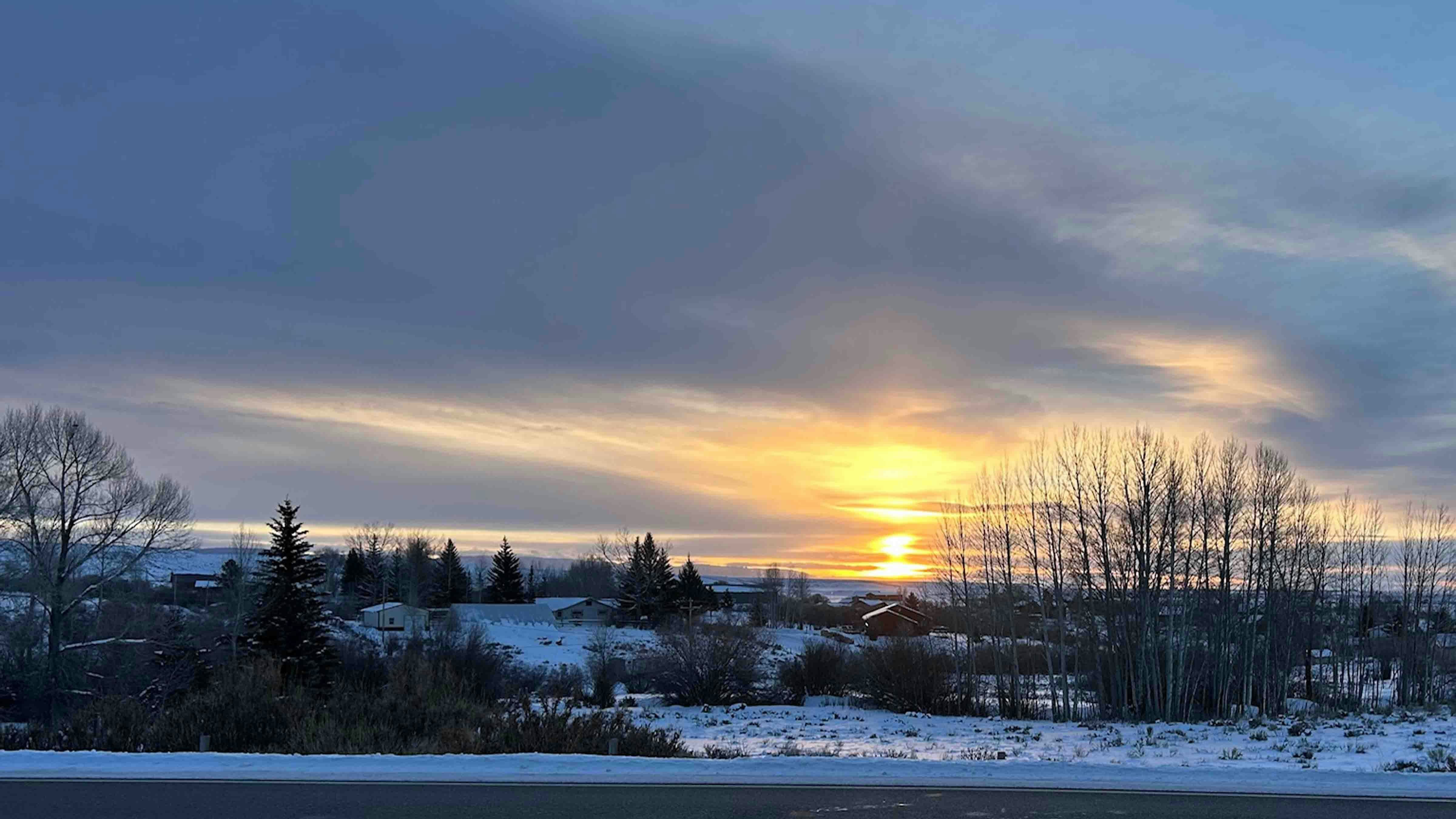 "Taken at Broken Hill and  Fremont Lake Road in Pinedale. I’m visiting my daughter and love Wyoming sunrises!"