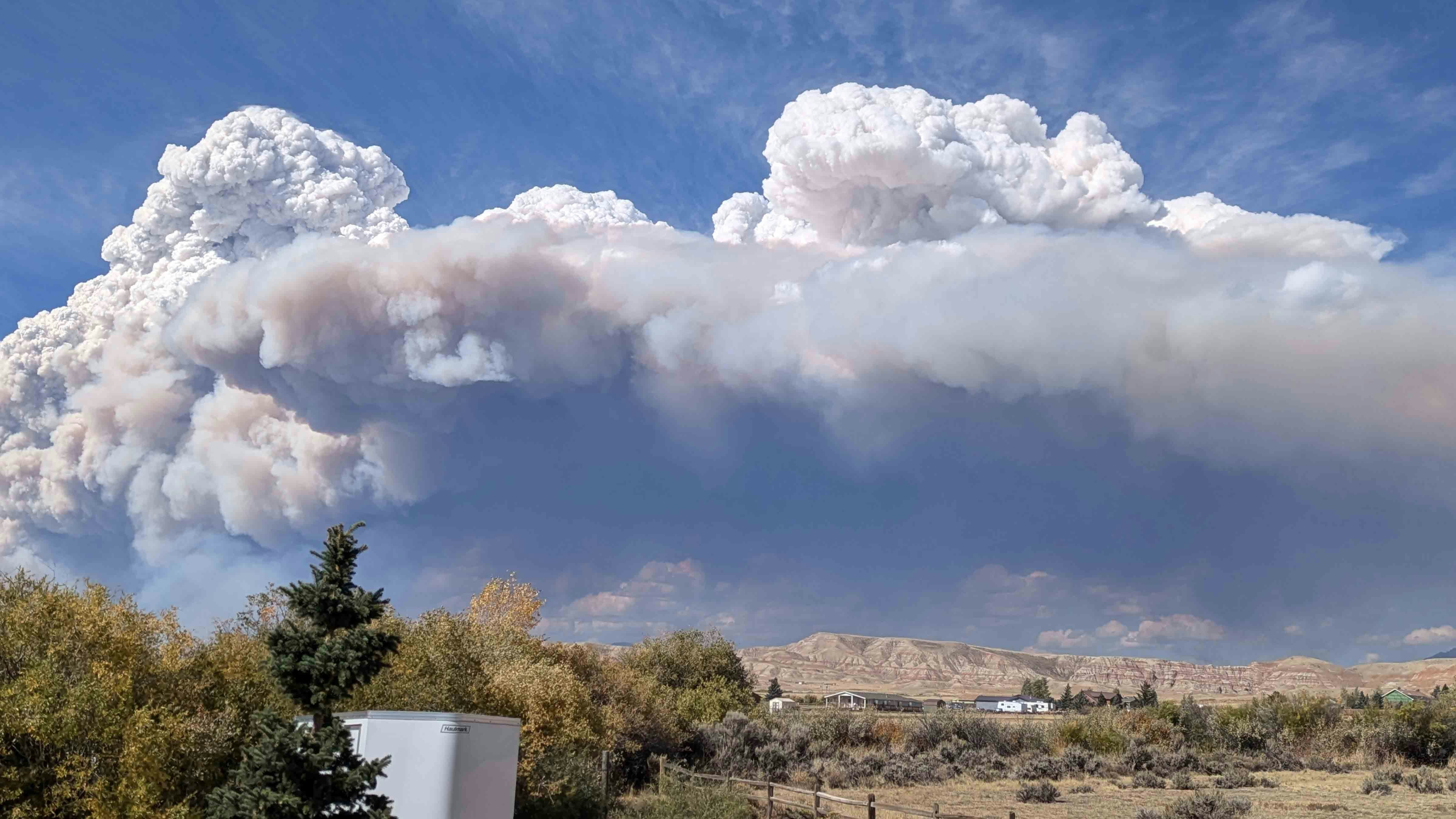 "Afternoon smoke plume over Antelope Hills Golf Course in Dubois."