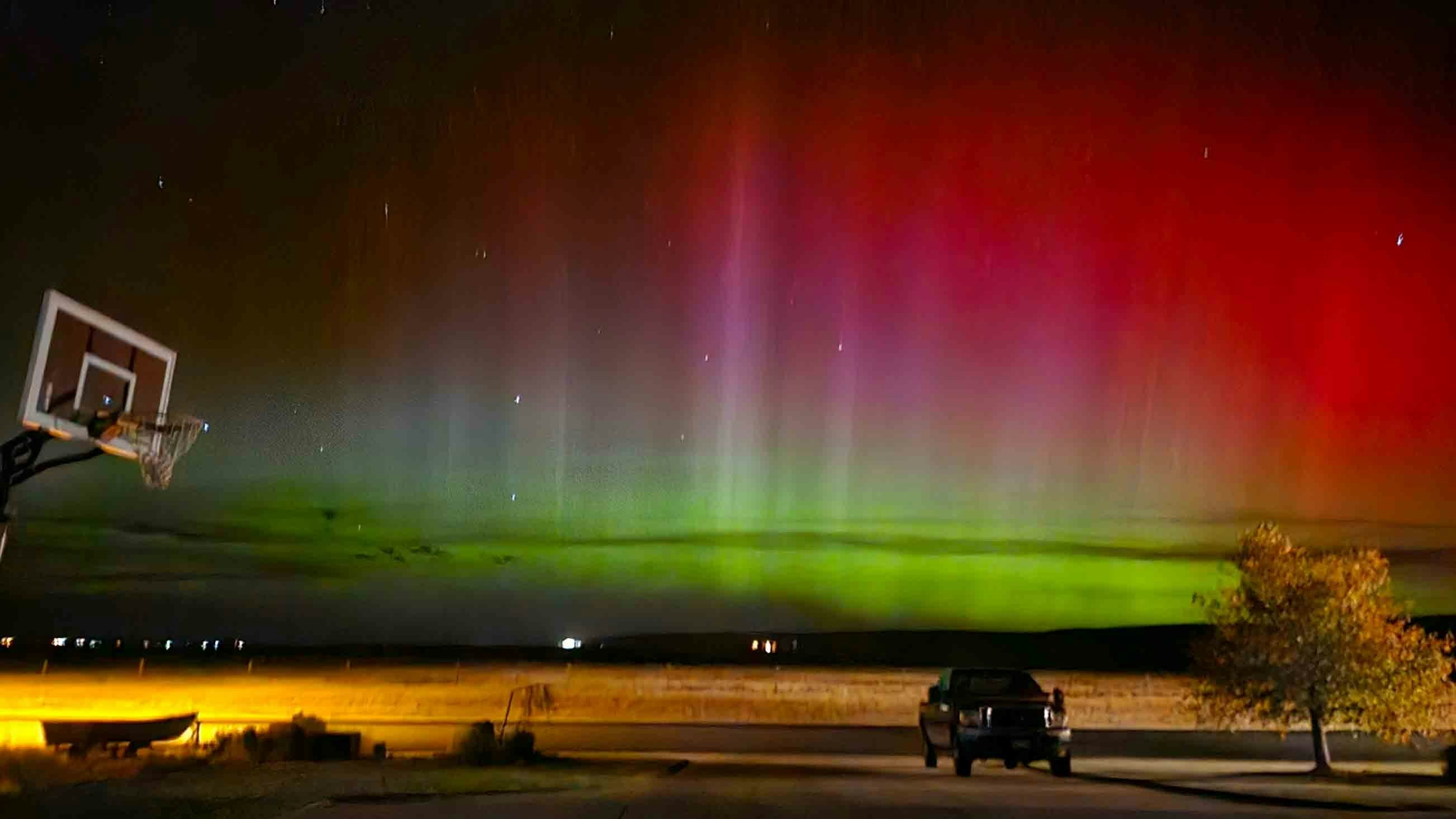 "I ventured outside to see if we could catch the Northern Lights and was delighted to see the vibrance! This is taken from Laramie."