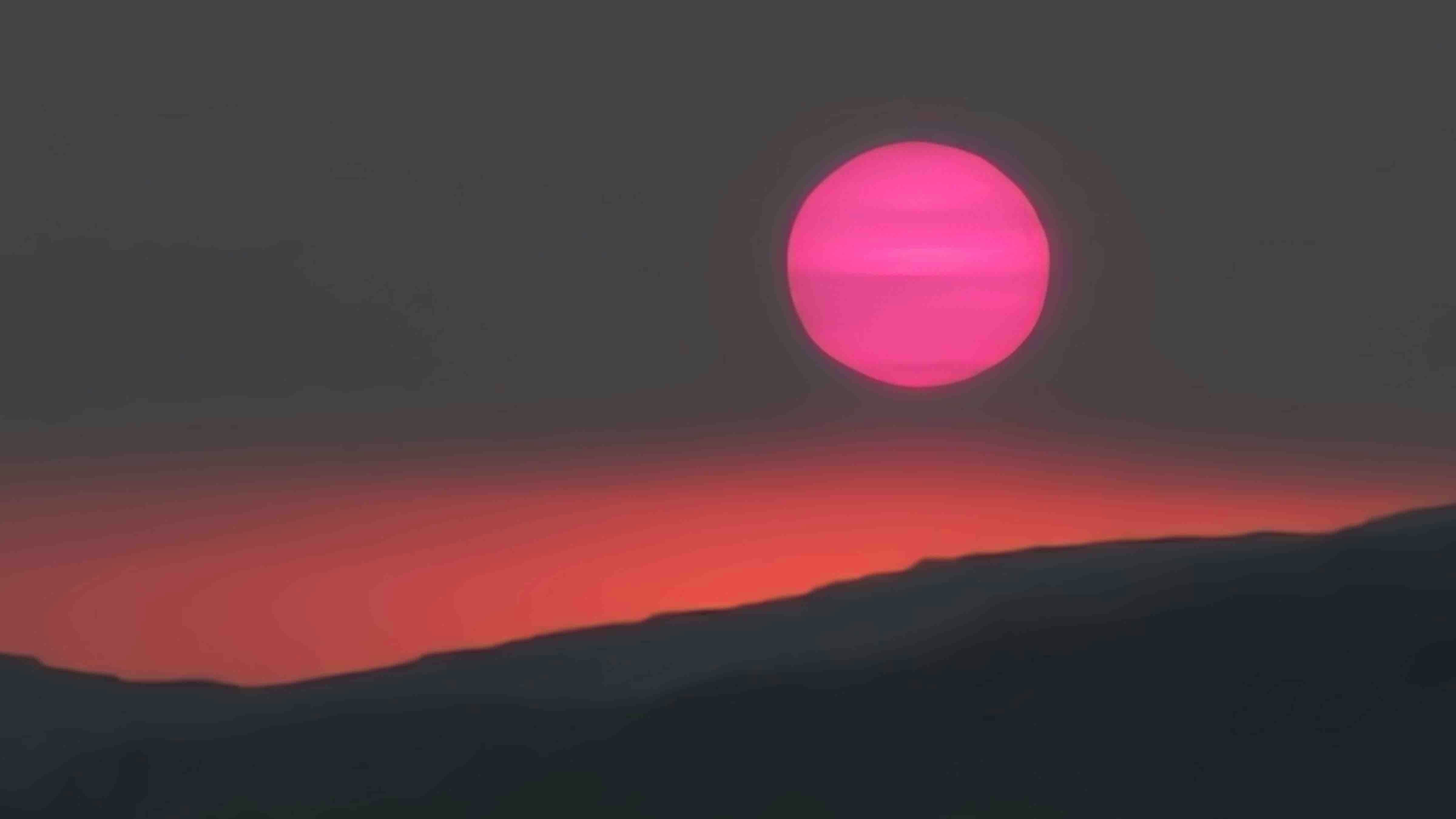 Smoke and fire are terrible but make some very beautiful pictures of a pink sun over the Greybull River Valley.