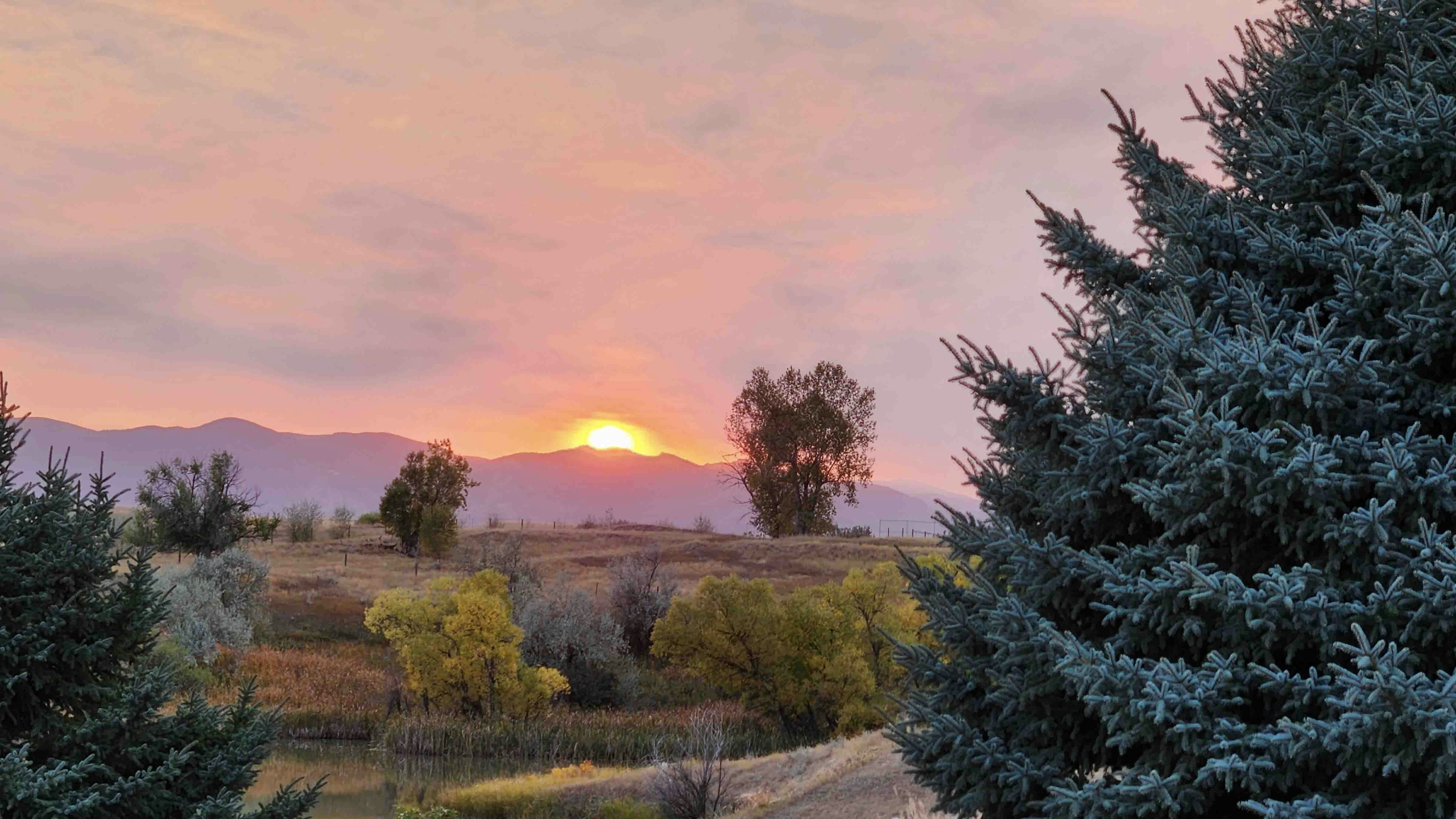 "This evening's sunset looking west to the Big Horns through the smoke from Elk fire above Dayton."