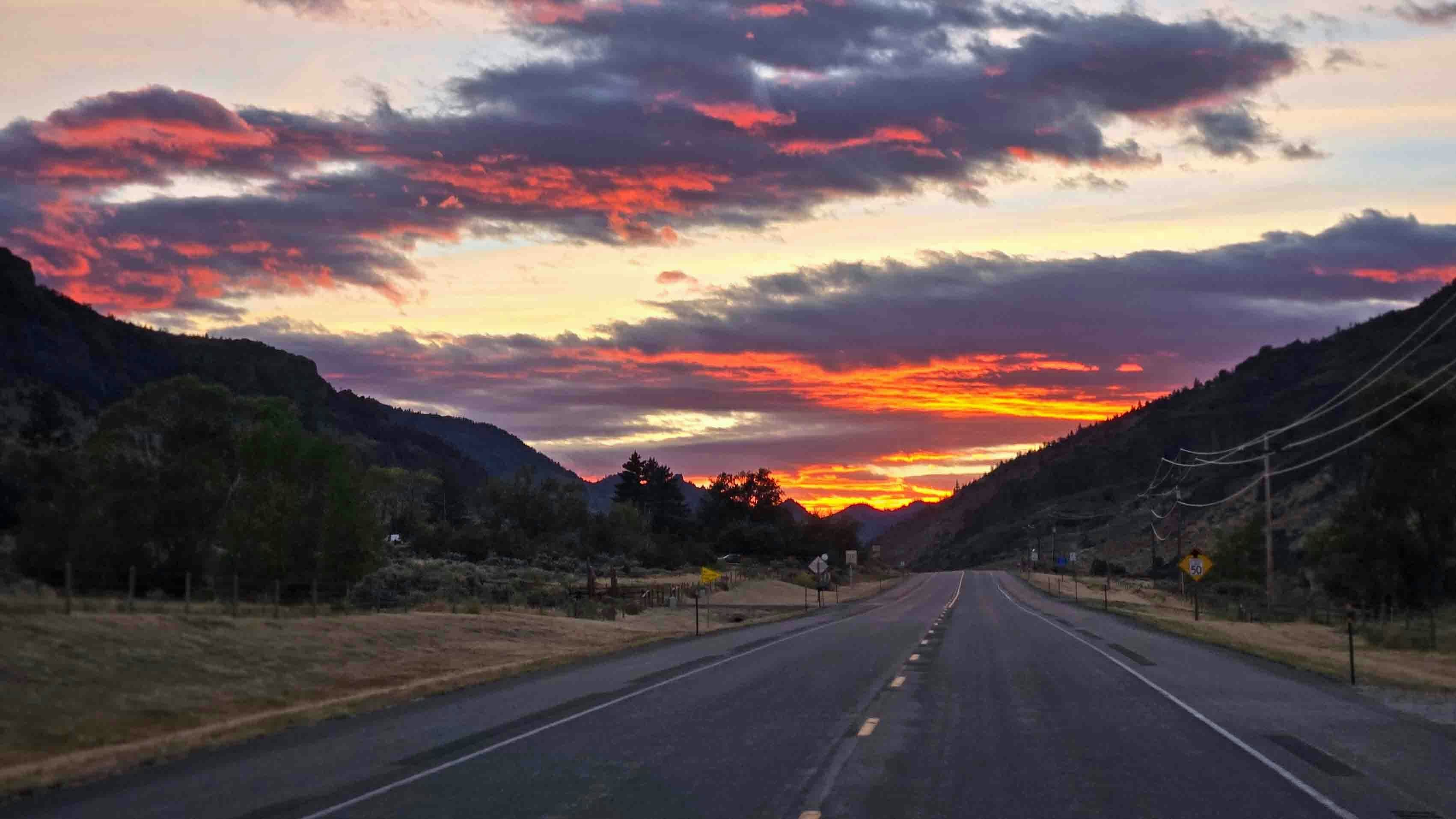 "Sunset East Entrance to Yellowstone Park meets Wapiti Valley."