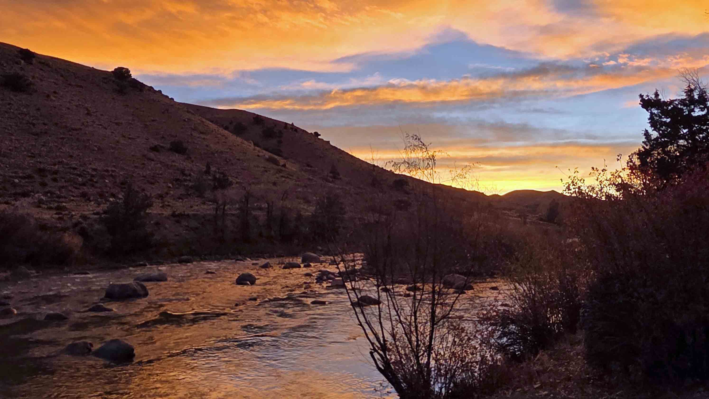 "Early morning sunrise on the Wind River 6 miles East of Dubois."