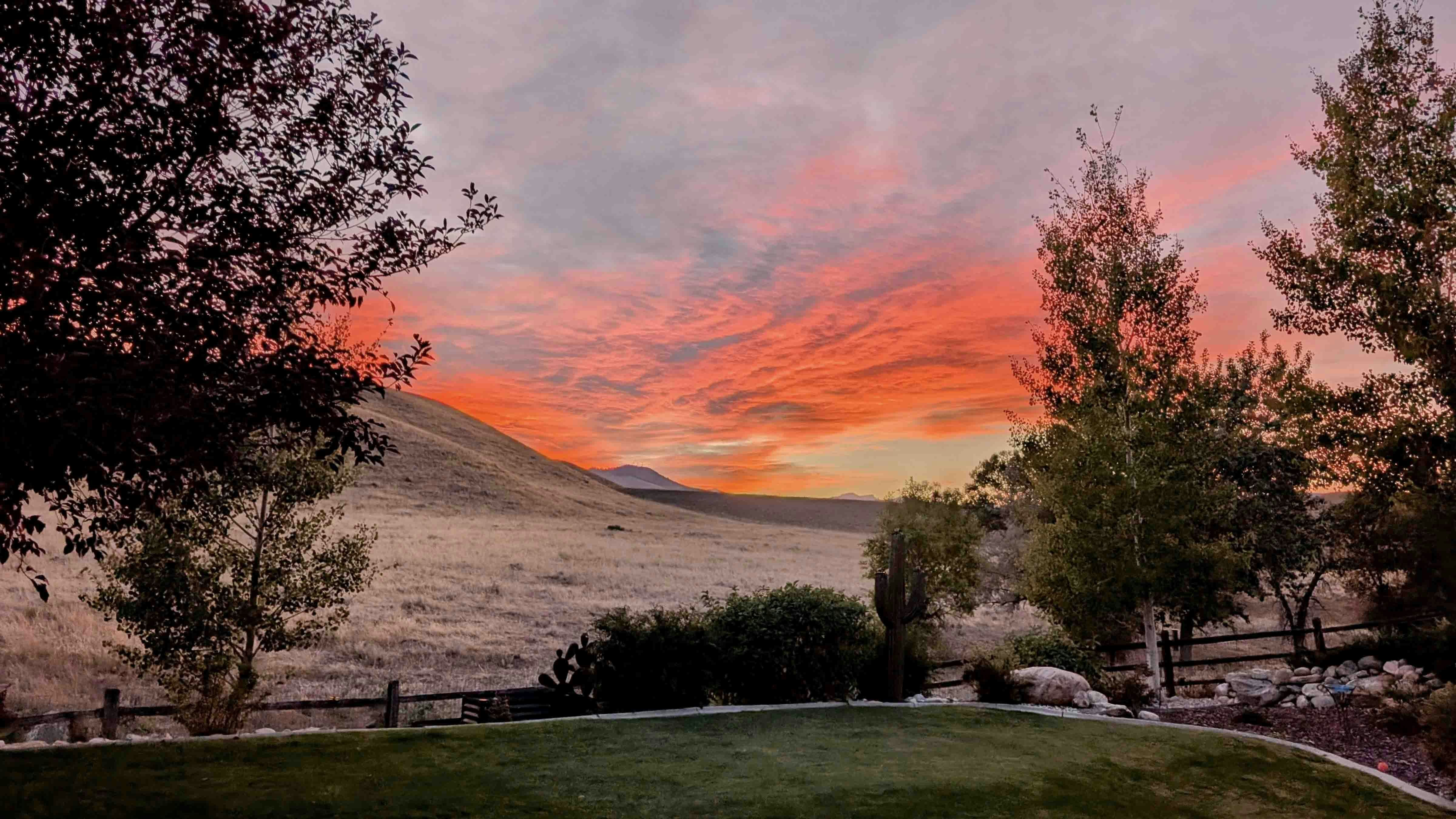 "This picture of the sunset was taken in Buffalo, Wyoming, this evening showing hints of the fires near us."