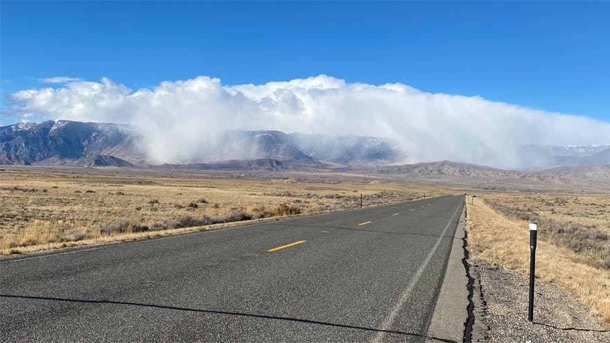 "Clouds capturing the Beartooth Mountains at Clark and Clark Canyon."