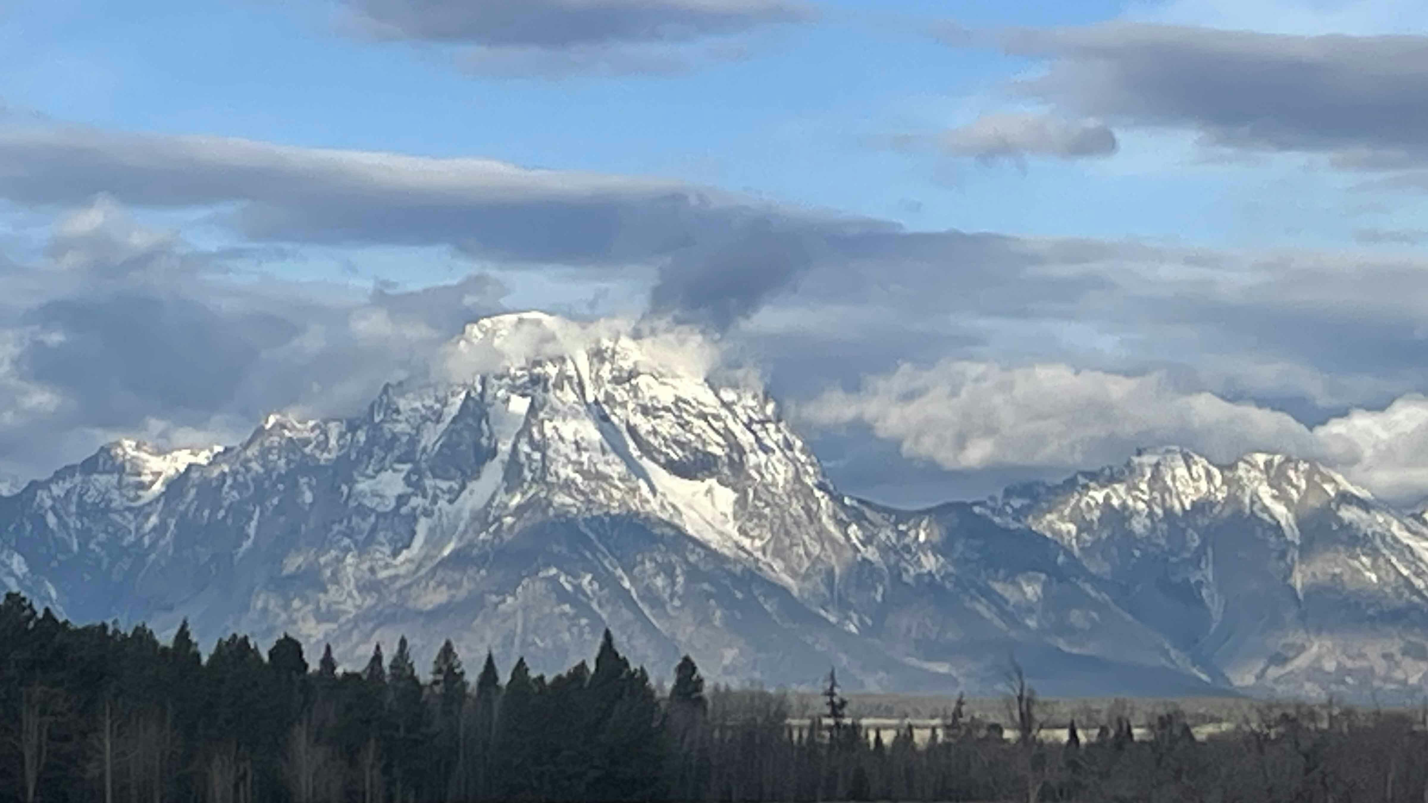 Sunrise on Mount Moran from Spread Creek north of Jackson
