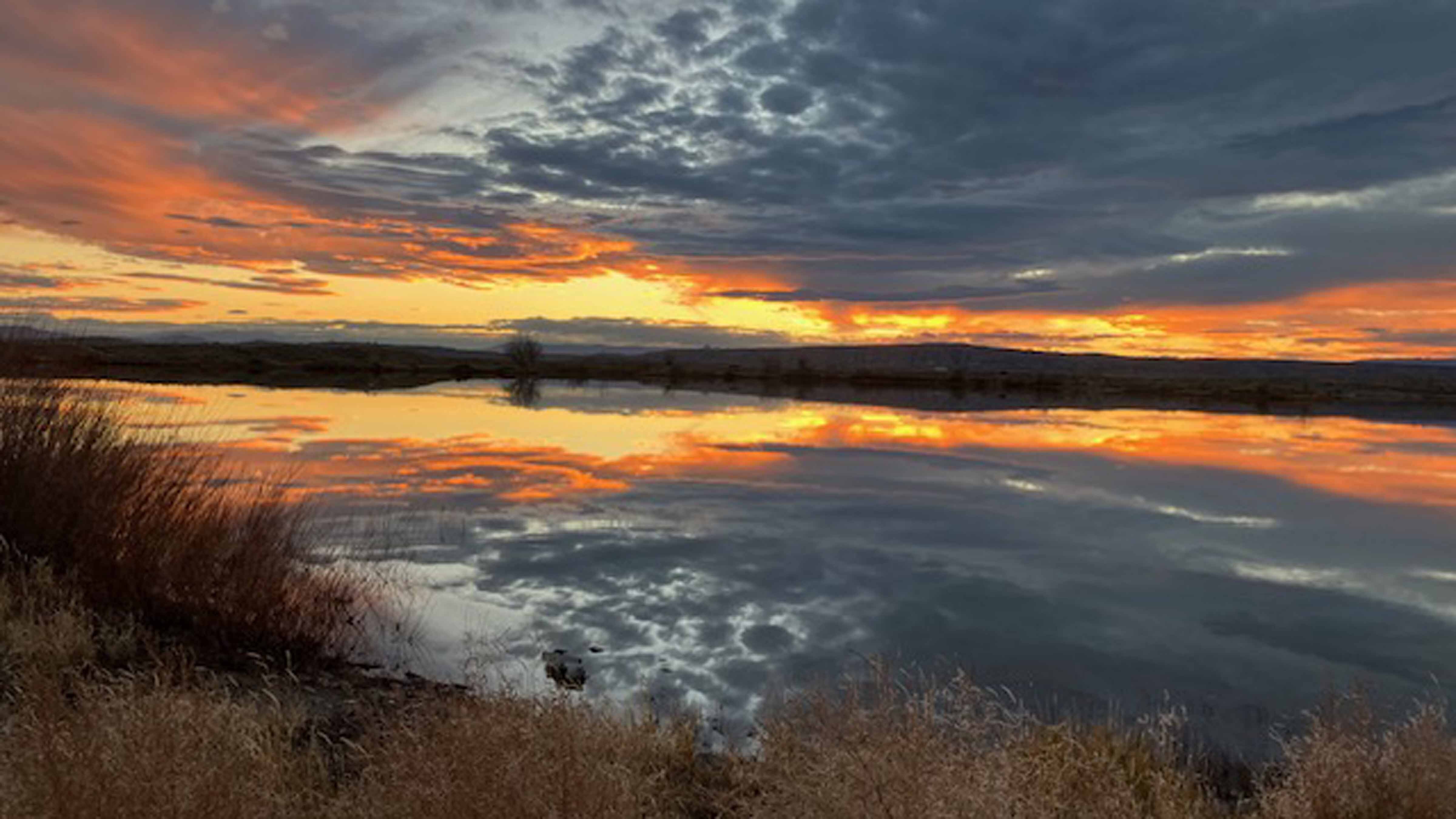 "Sunset over Deaver Reservoir."
