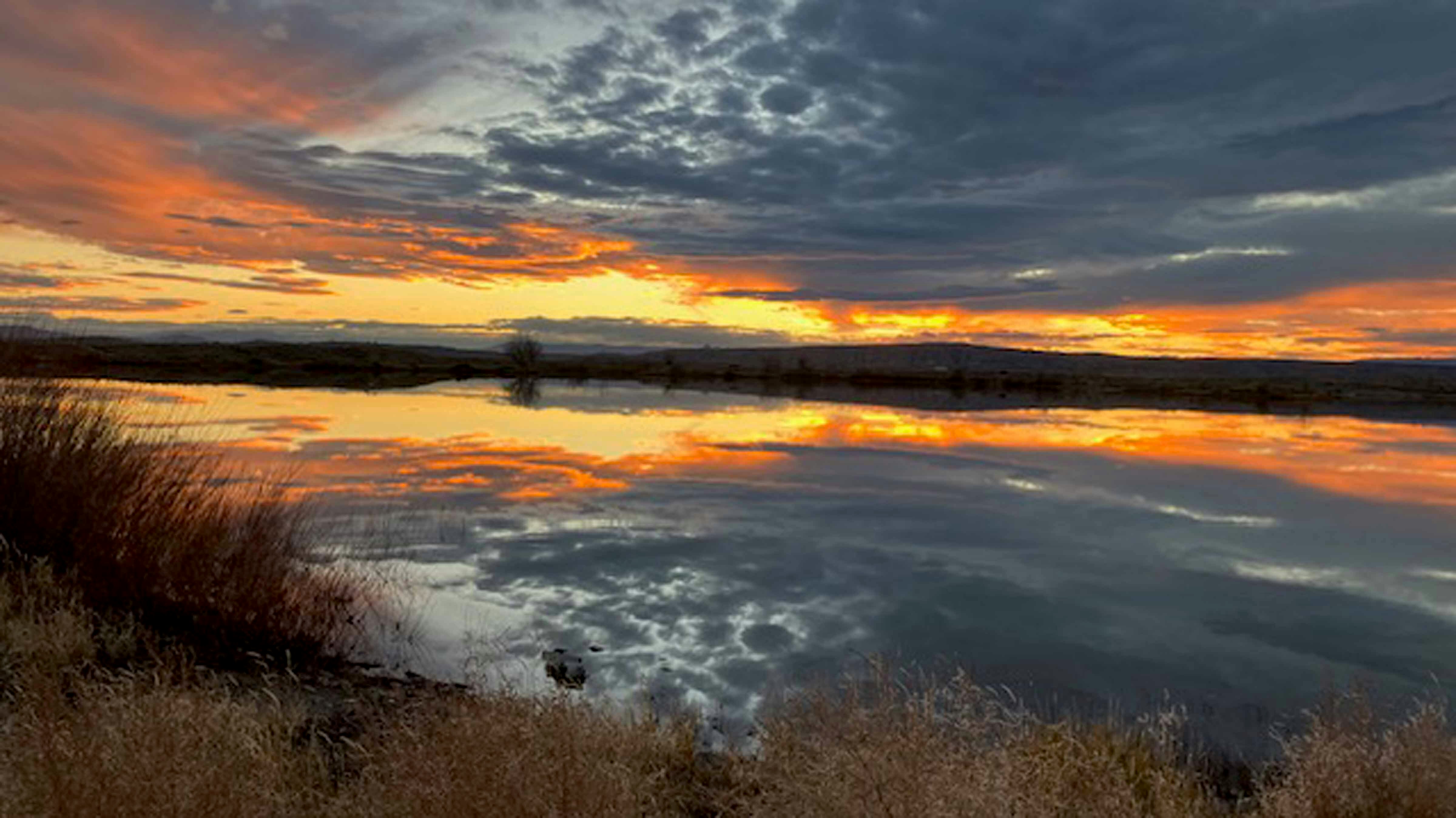 "Sunset over Deaver Reservoir."