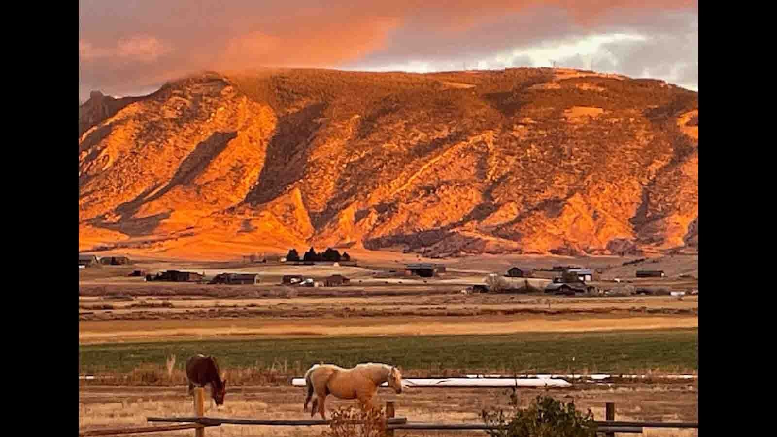 "I love this picture because the sun is rising in the east and lighting up Cedar Mountain in the west. Southfork Valley outside Cody.