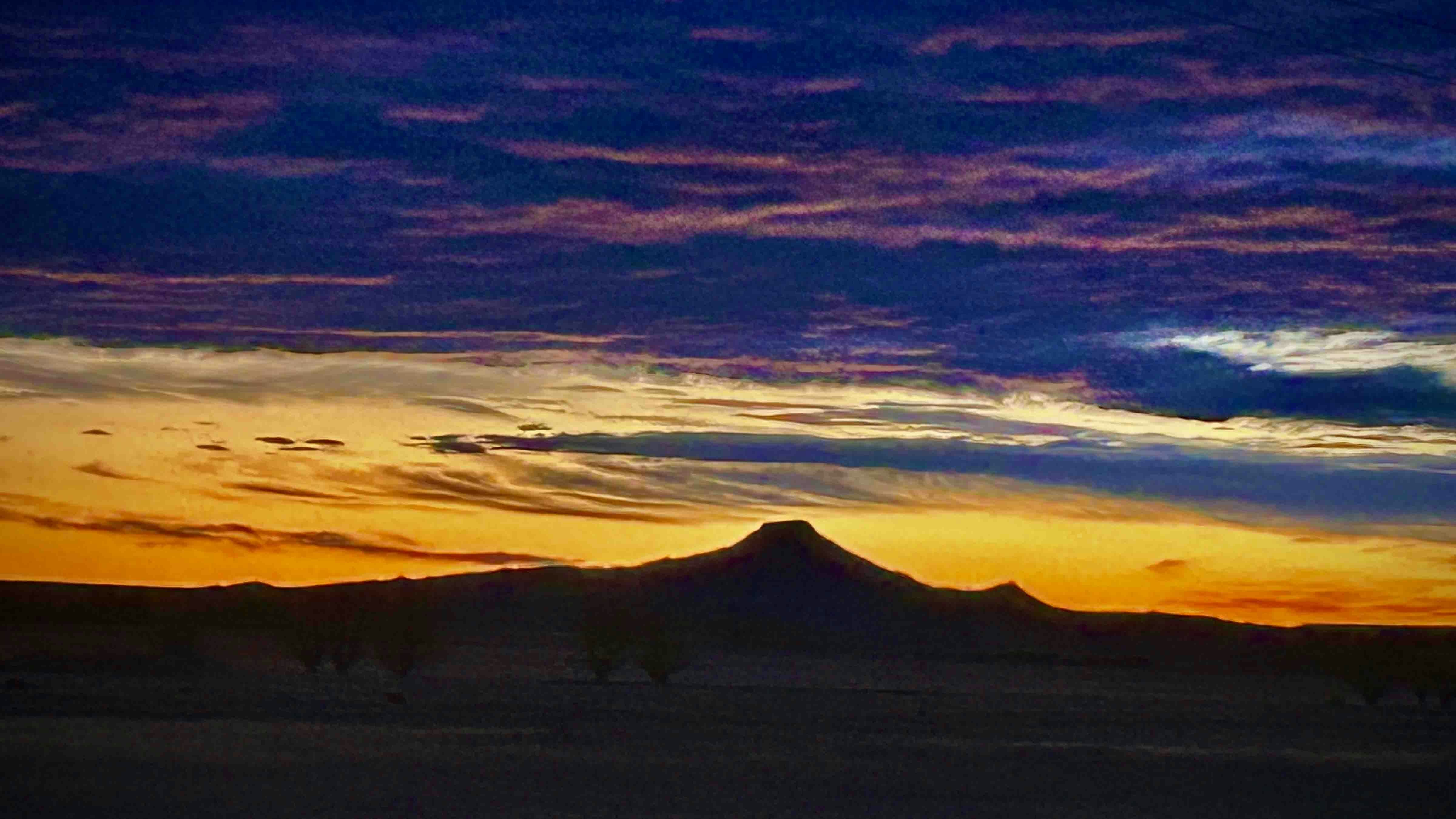 Silhouette sunrise on Crowheart Butte near Crowheart Wy!