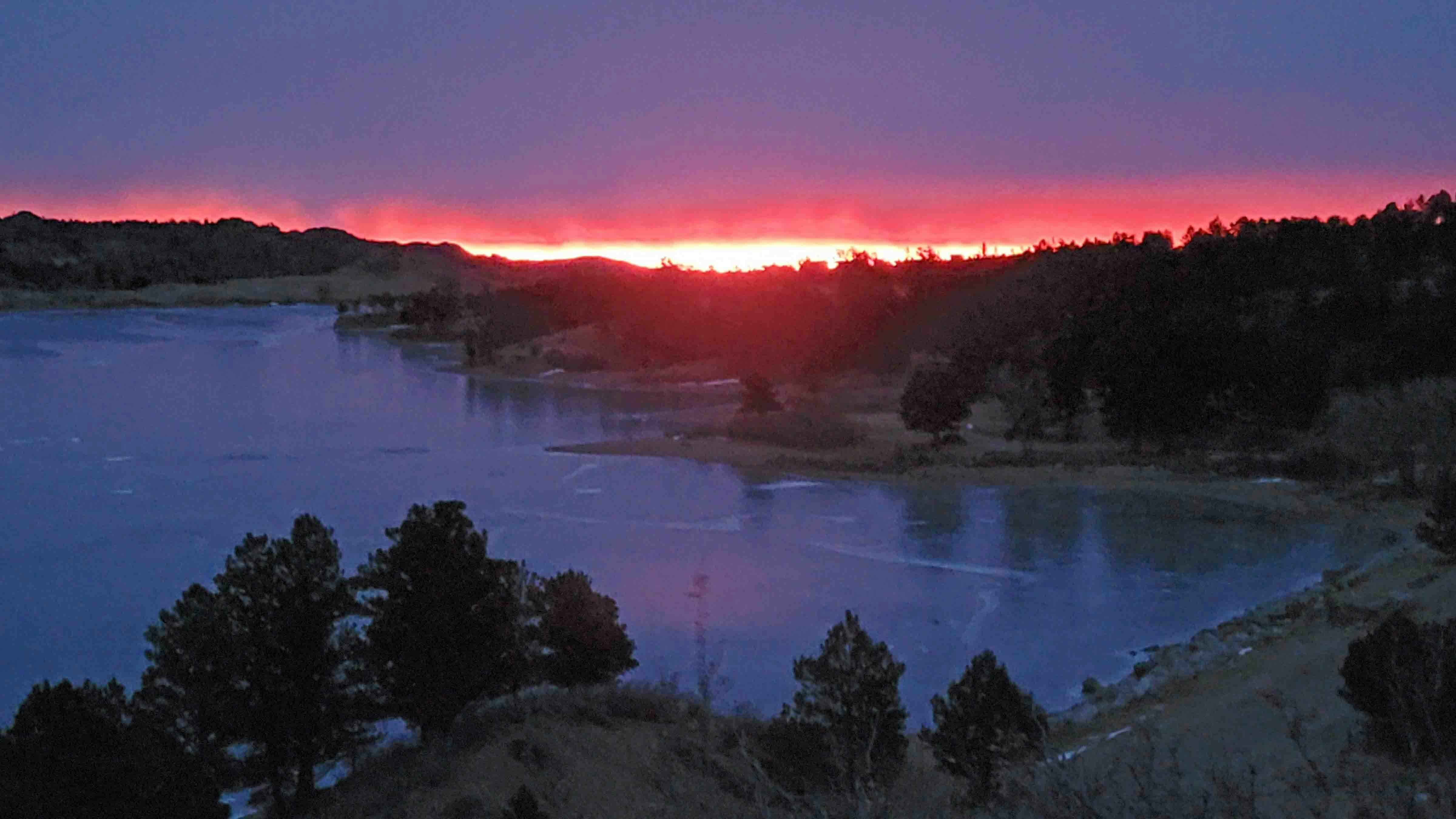 The sunrise glow is blazing over Granite Springs reservoir skyline! A beautiful crisp morning on the Archery Field Course with 7 family hikers celebrating a WY Christmas from CA, IA, and WA!