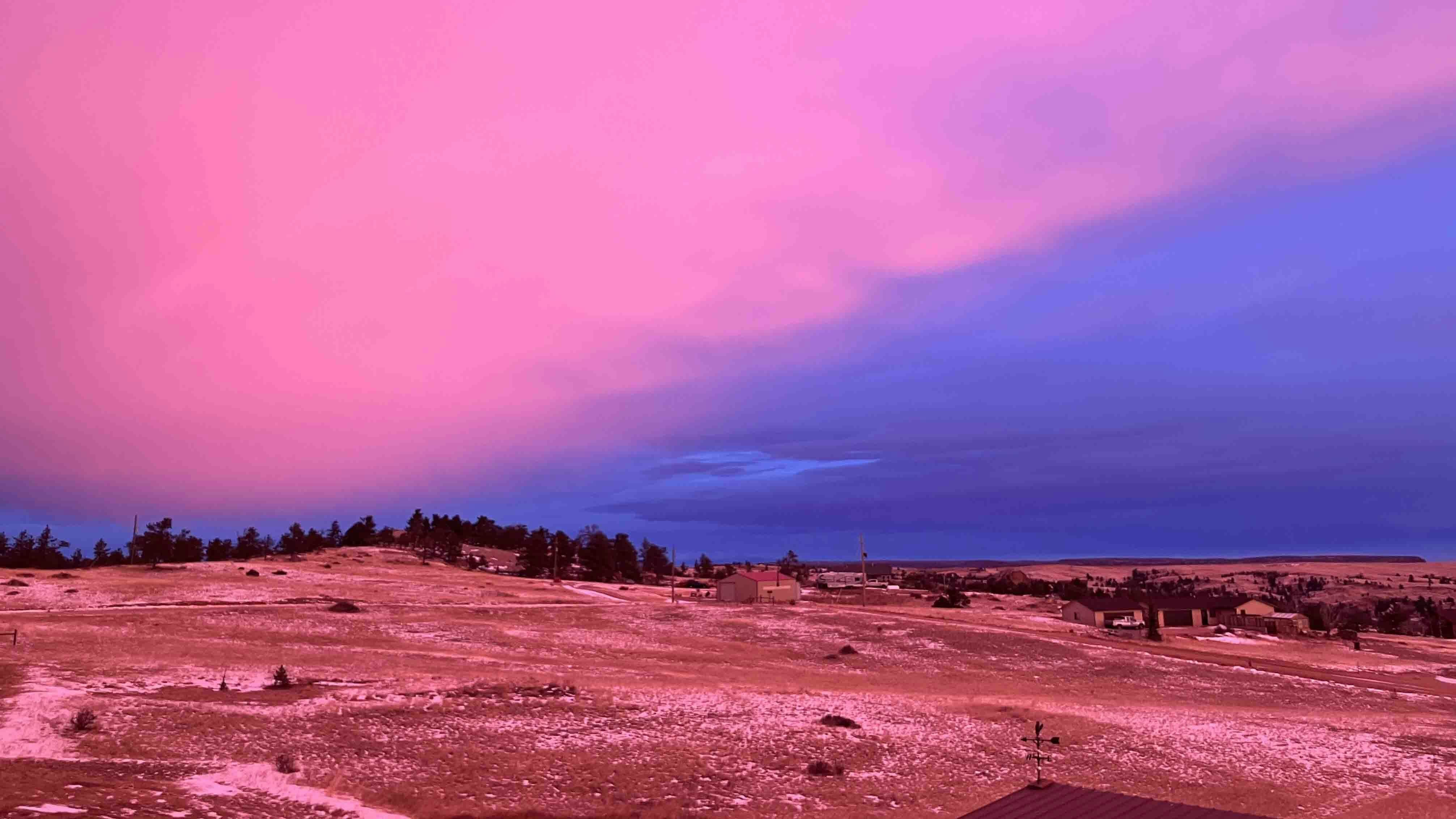 Surreal colors this morning, storm approaching at sunrise at 7am on Dec 4. Mountain Meadow, Cheyenne