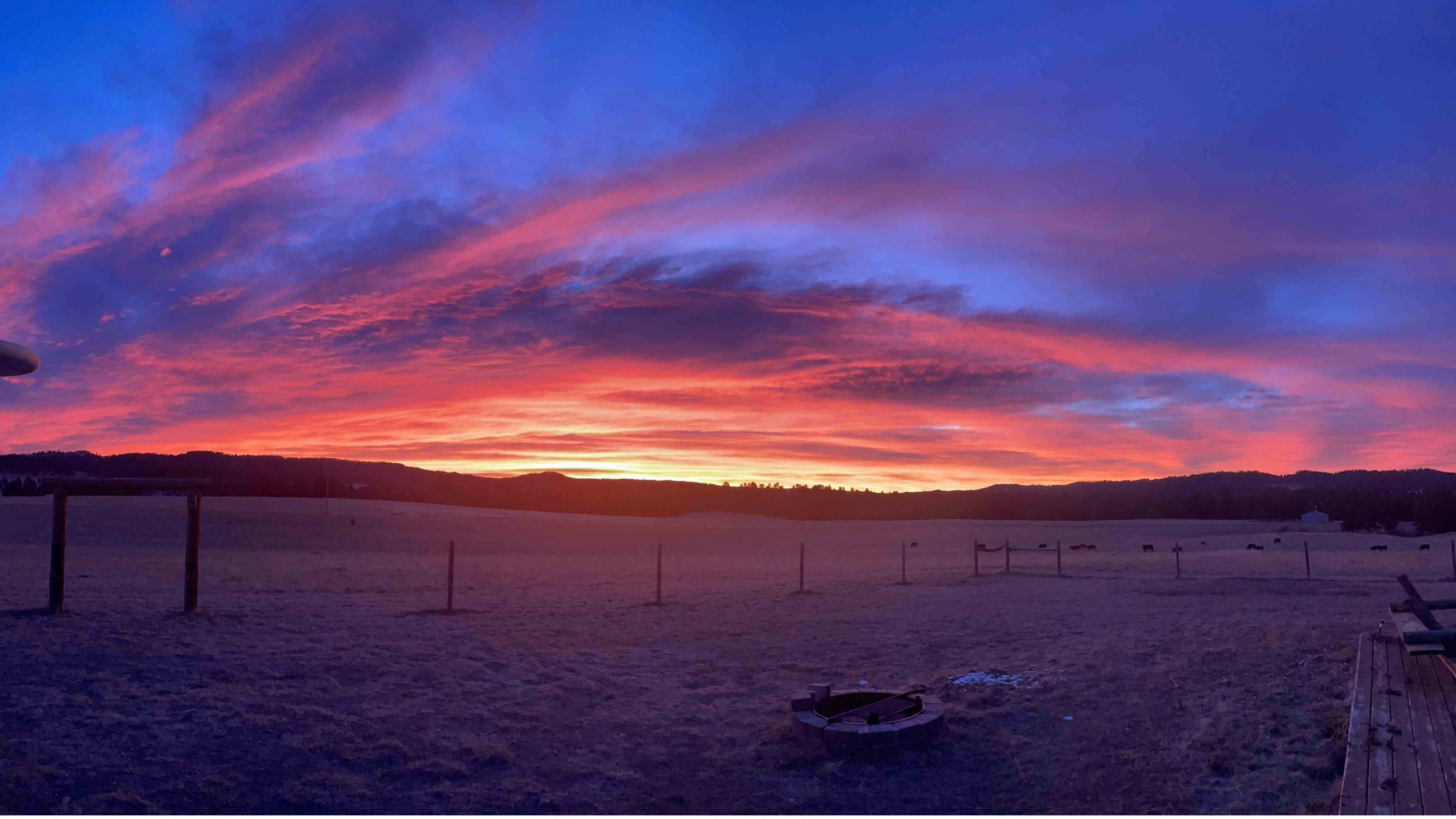 This was taken over the Bear Lodge Mountains east of Devils Tower. Chilly outside but still felt warm looking at that red hot sunrise.